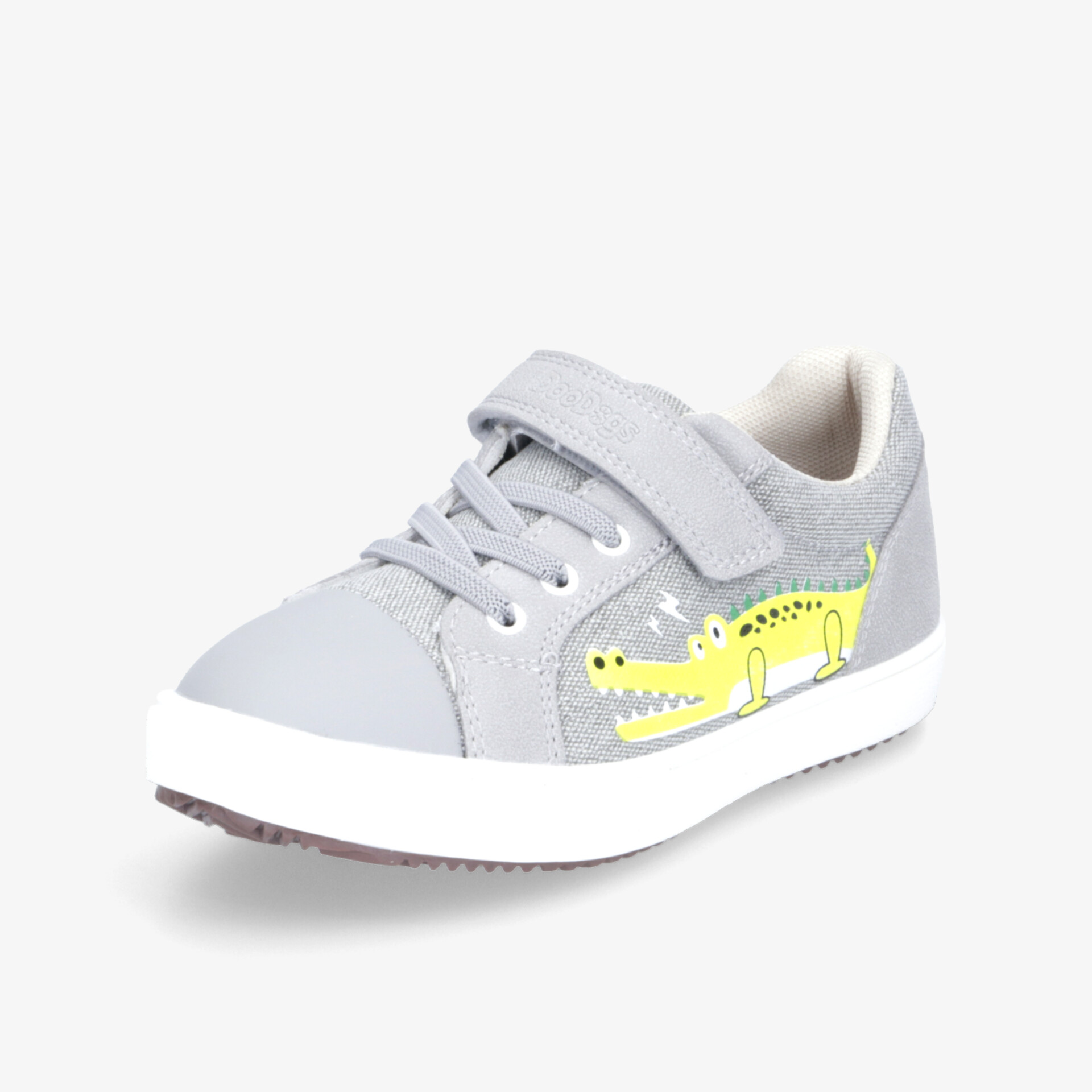 Grauer Kinderschuh mit gelbem Krokodil-Design, Klettverschluss und bequemer, flexibler Sohle.