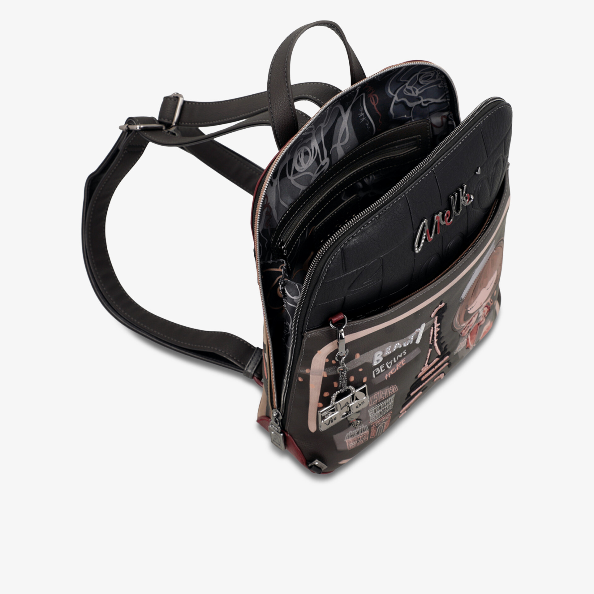 Kleine schwarze Tasche mit mehreren Reißverschlussfächern und verstellbarem Schultergurt für vielseitige Nutzung