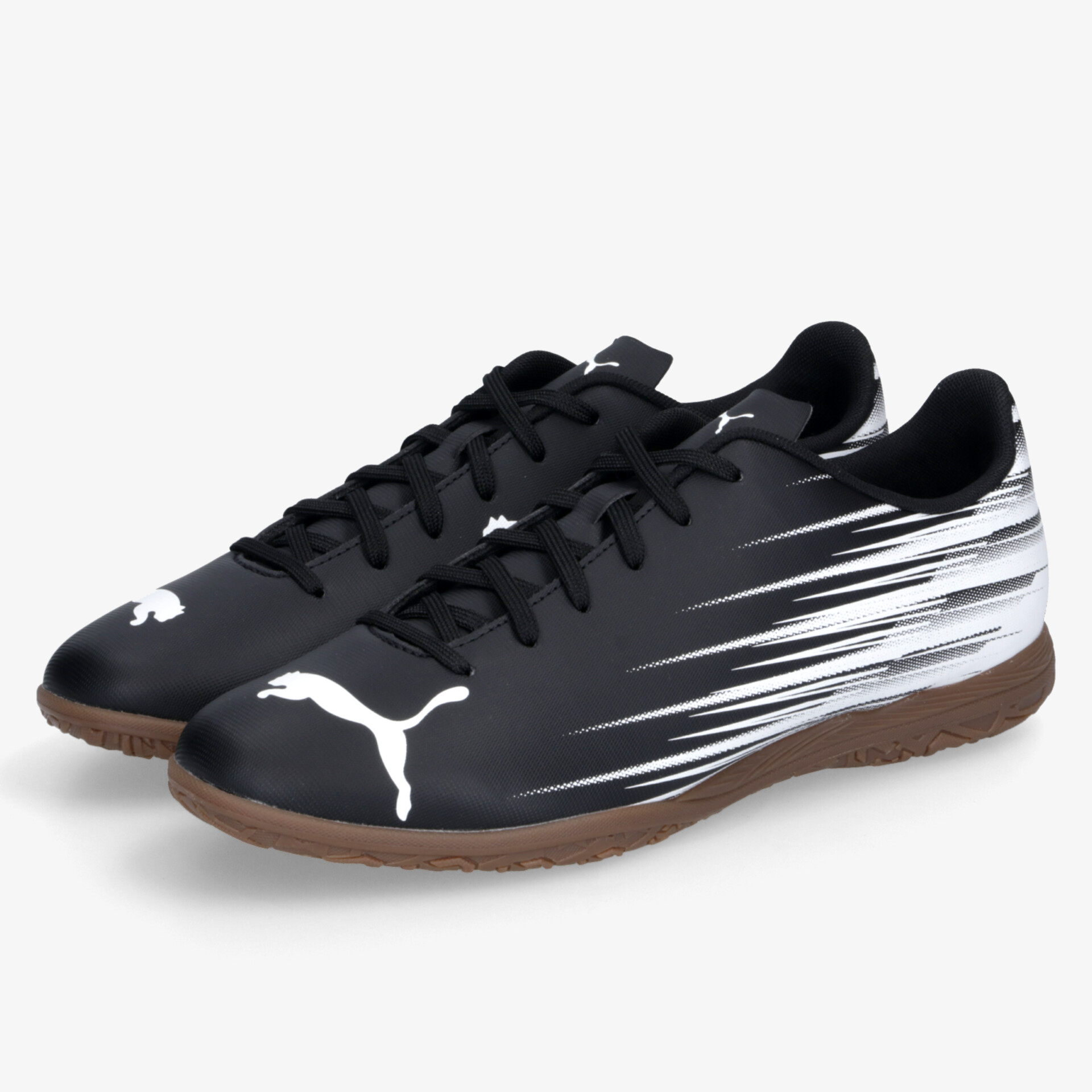 Leichte und bequeme Puma Hallenschuhe mit rutschfester Sohle und sportlichem Design in Schwarz und Weiß