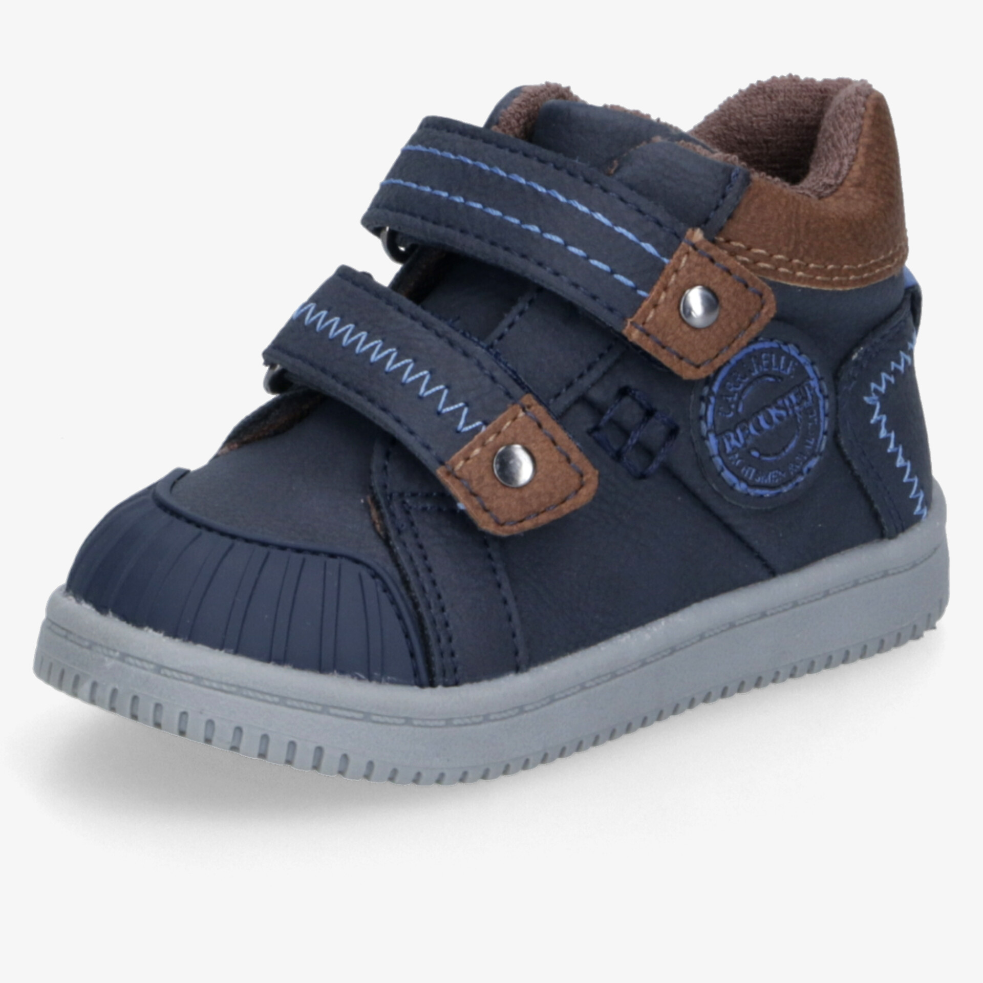 Blauer Kinderschuh mit doppeltem Klettverschluss und rutschfester Sohle für bequemen Halt und einfache Handhabung