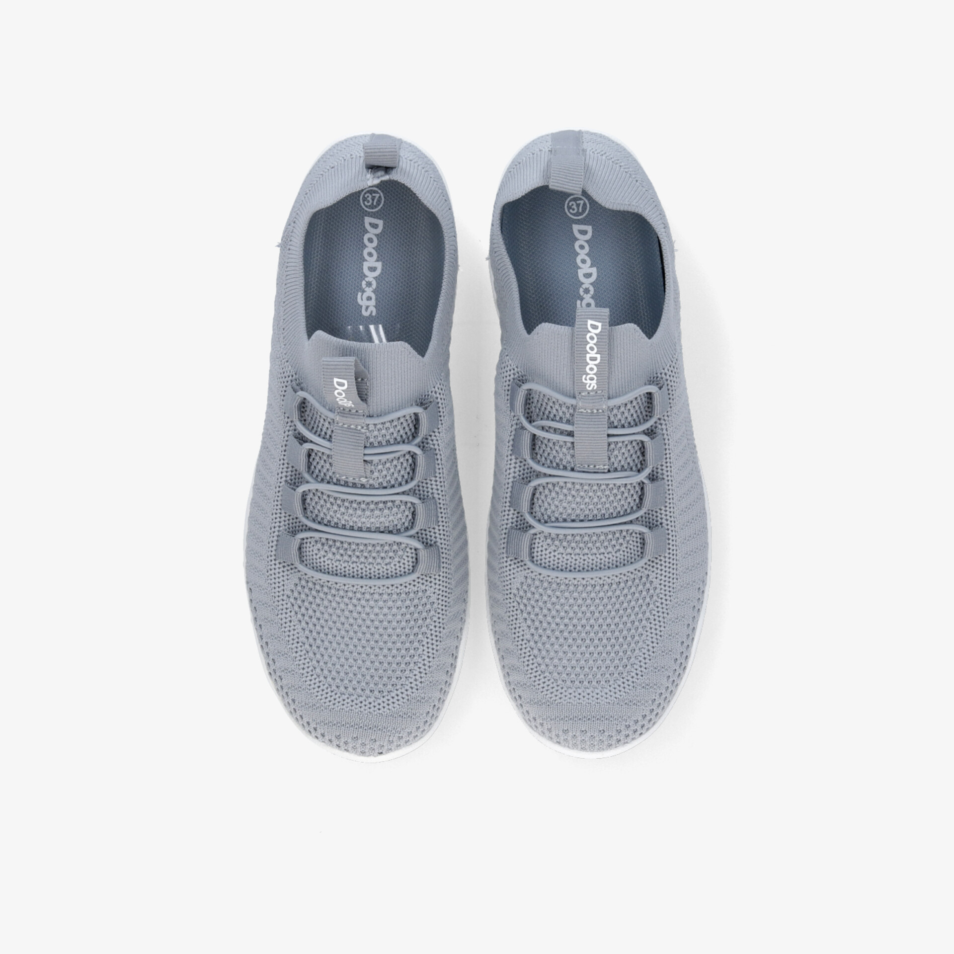 Atmungsaktive, leichte graue Sneaker mit bequemen Schnürsenkeln und modernem Design, Draufsicht auf das Paar