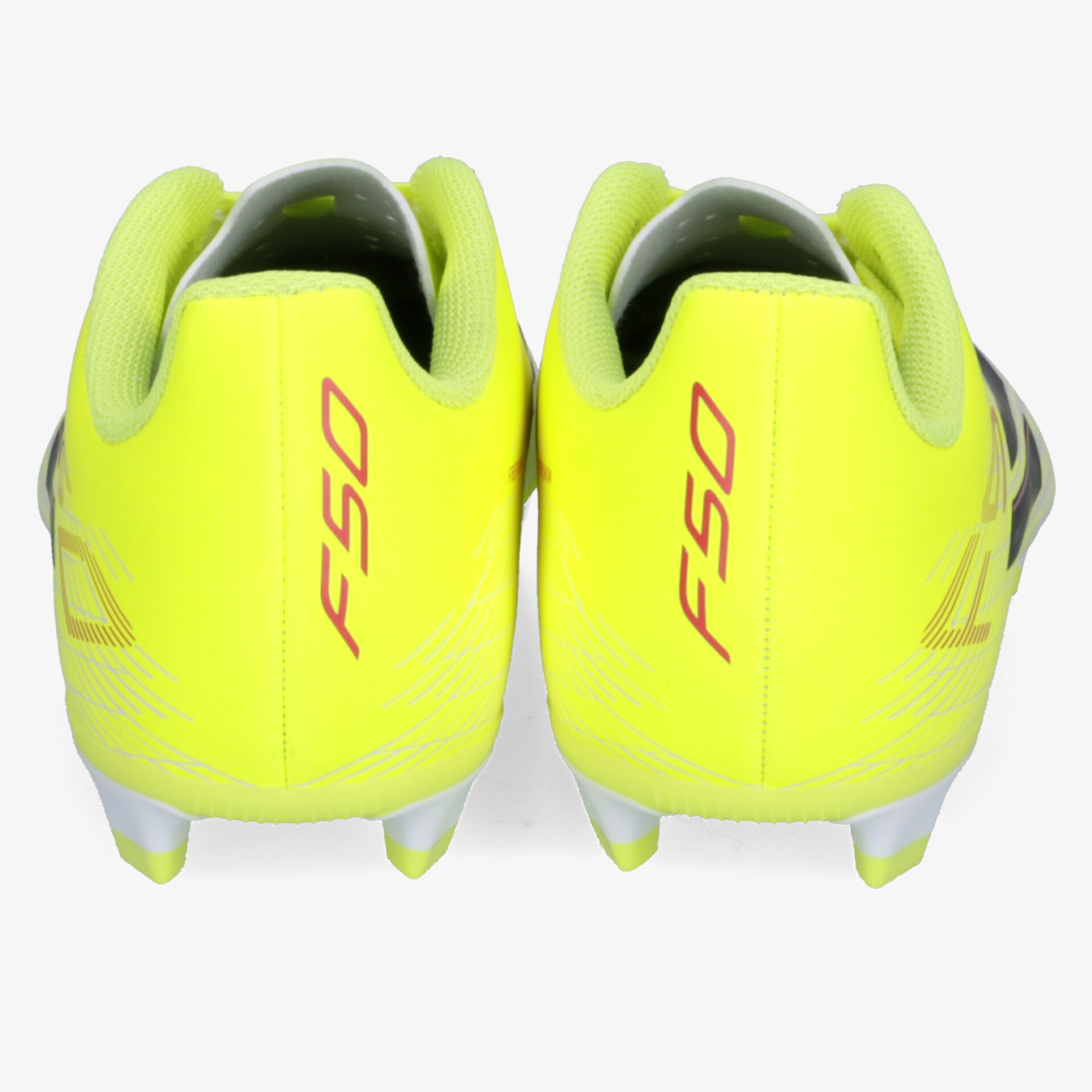 Rückansicht von leuchtend gelben Fußballschuhen mit Profilstollen und deutlich sichtbarem FSO Schriftzug