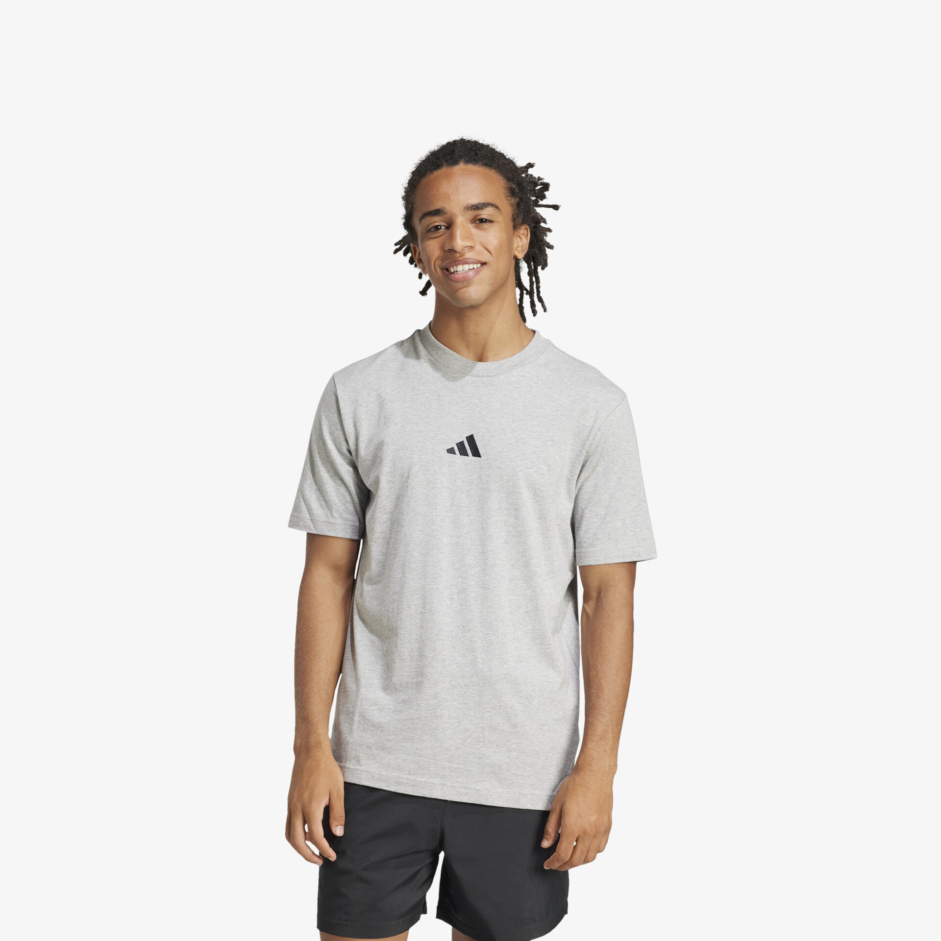 Graues Adidas T-Shirt mit klassischem Design und rundem Halsausschnitt, bequem und atmungsaktiv getragen