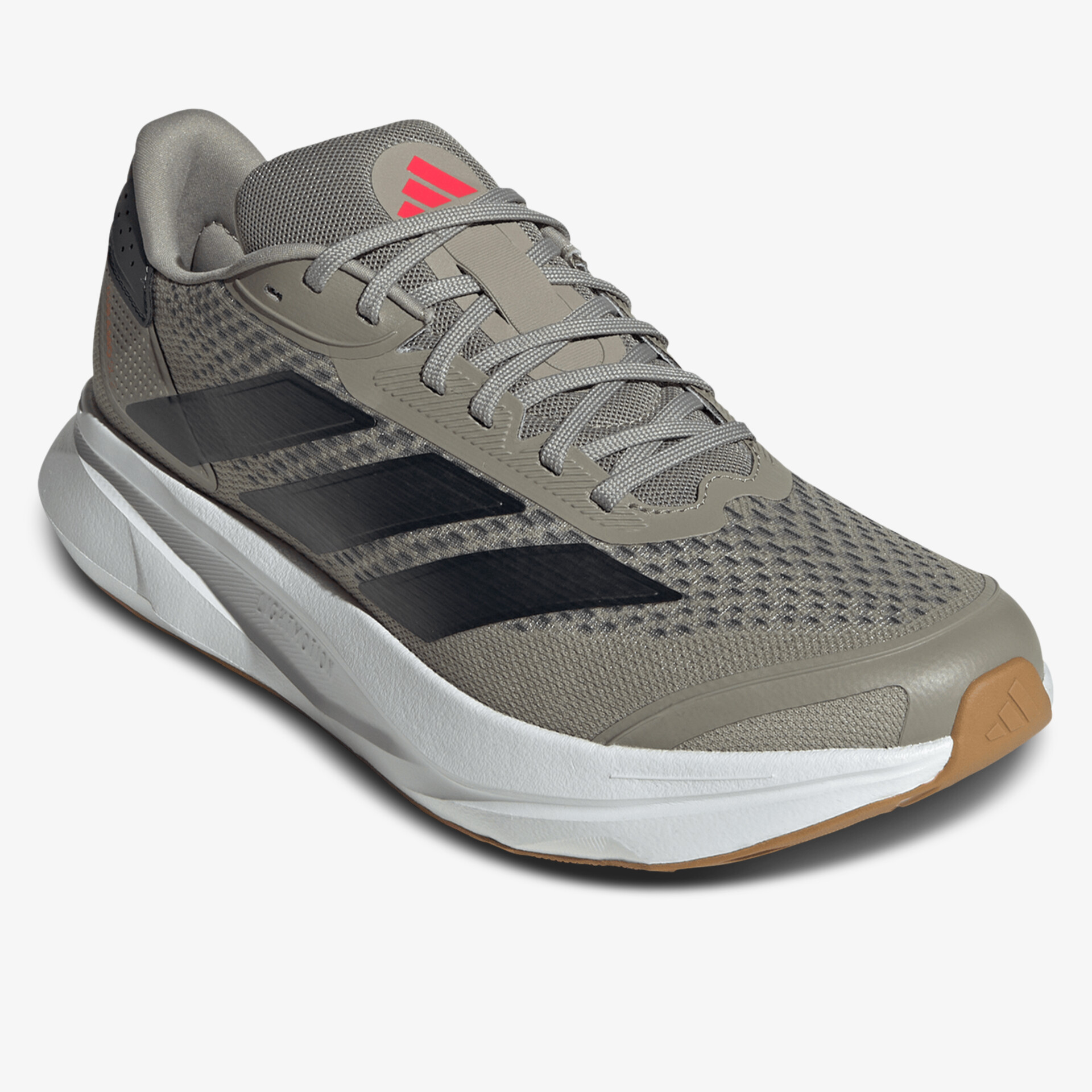 Leichter atmungsaktiver Sportschuh mit robustem Profil und modernem Design in grauer Farbkombination