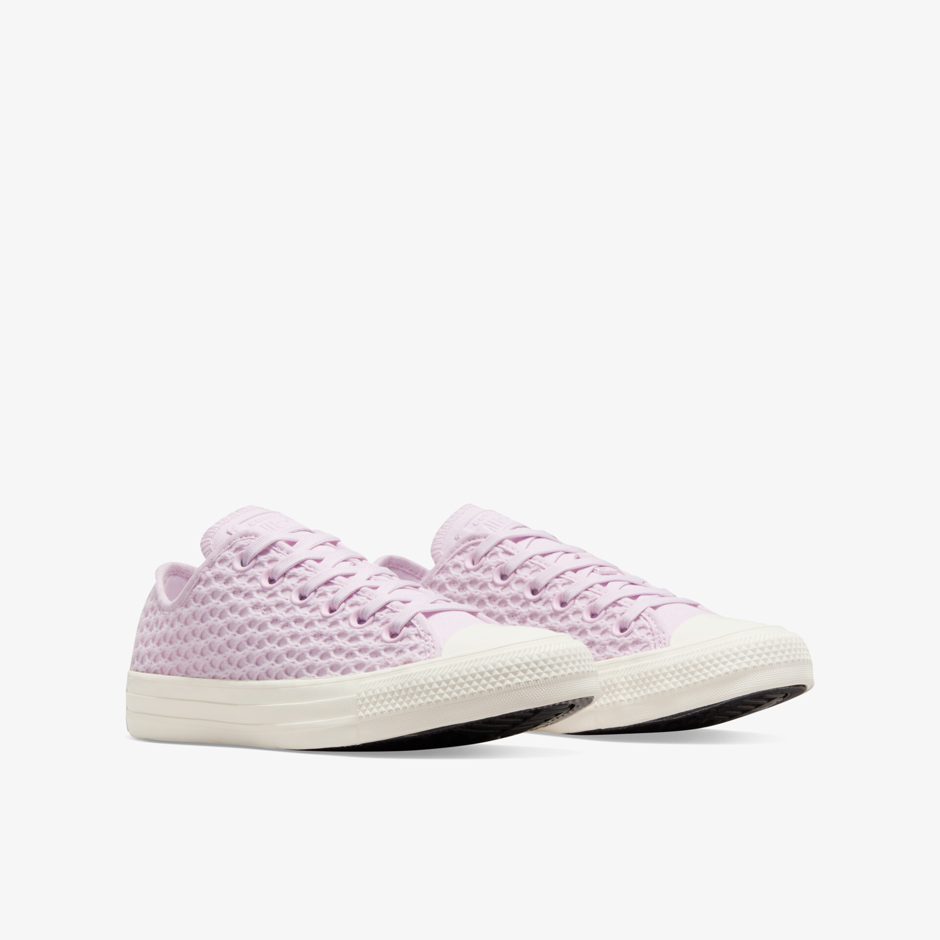 Leichtes Sneakerpaar in zartem Lila mit atmungsaktivem Material und flexibler Sohle für hohen Tragekomfort