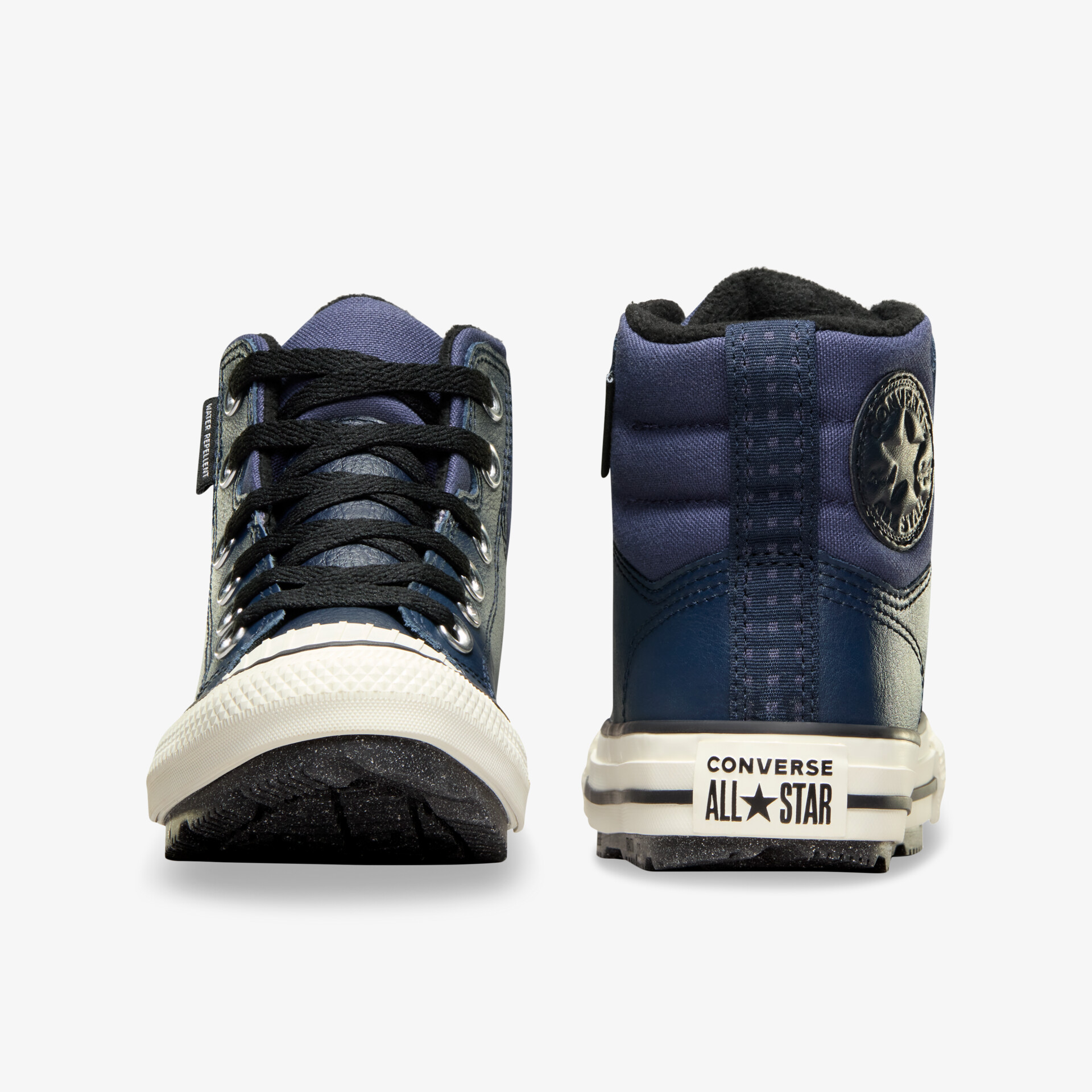 Converse All Star Schuhe in Blau, Front- und Rückansicht zeigt robuste Schnürung und stabilen Sohlenprofil