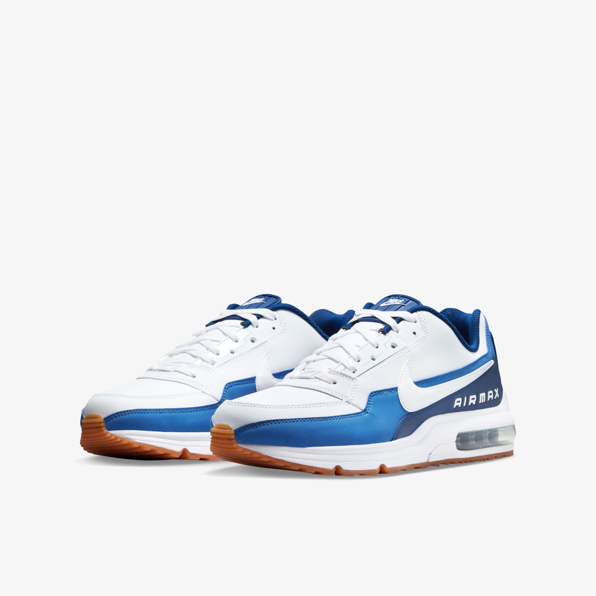 Stilvolle blaue und weiße Sneakers mit robustem Design, ideal für sportliche Aktivitäten und täglichen Komfort.