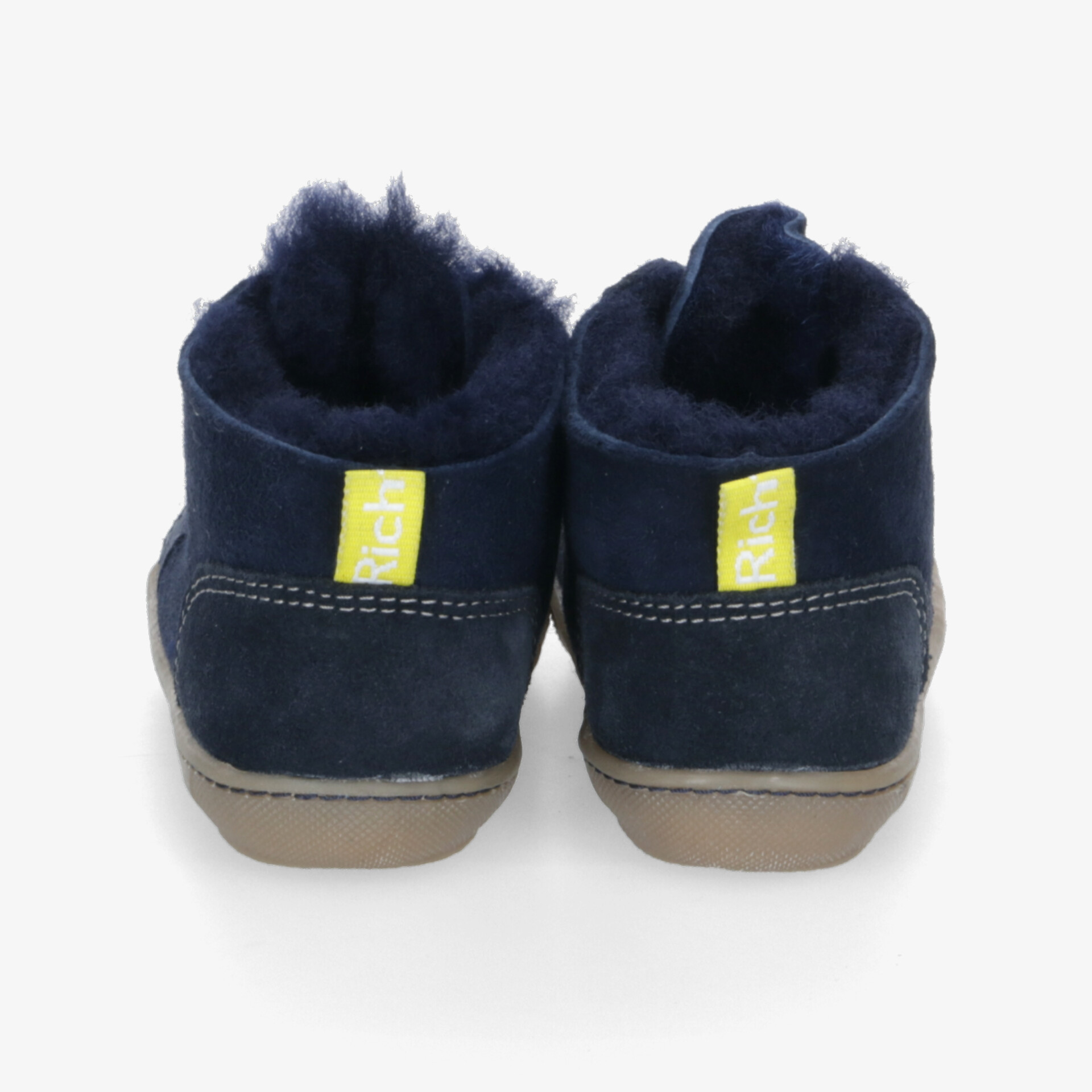 Rückansicht von warm gefütterten, bequemen Schuhen mit rutschfester Sohle und weichem Material in Navy Blau