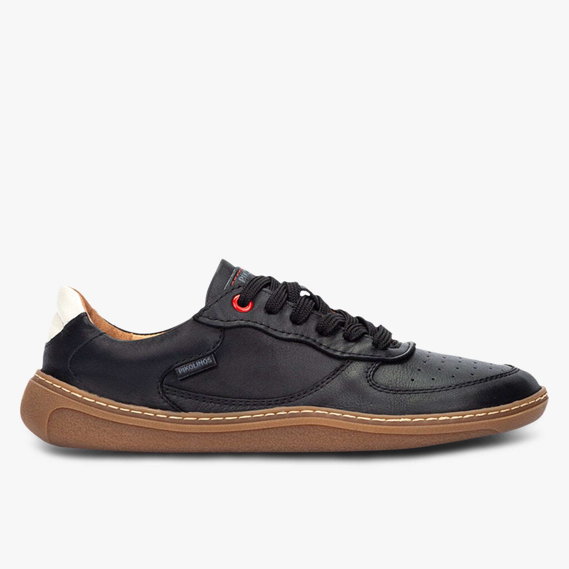 Seitliche Ansicht schwarzer Sneaker mit brauner Sohle, bequemer Schnitt und sportivem Design