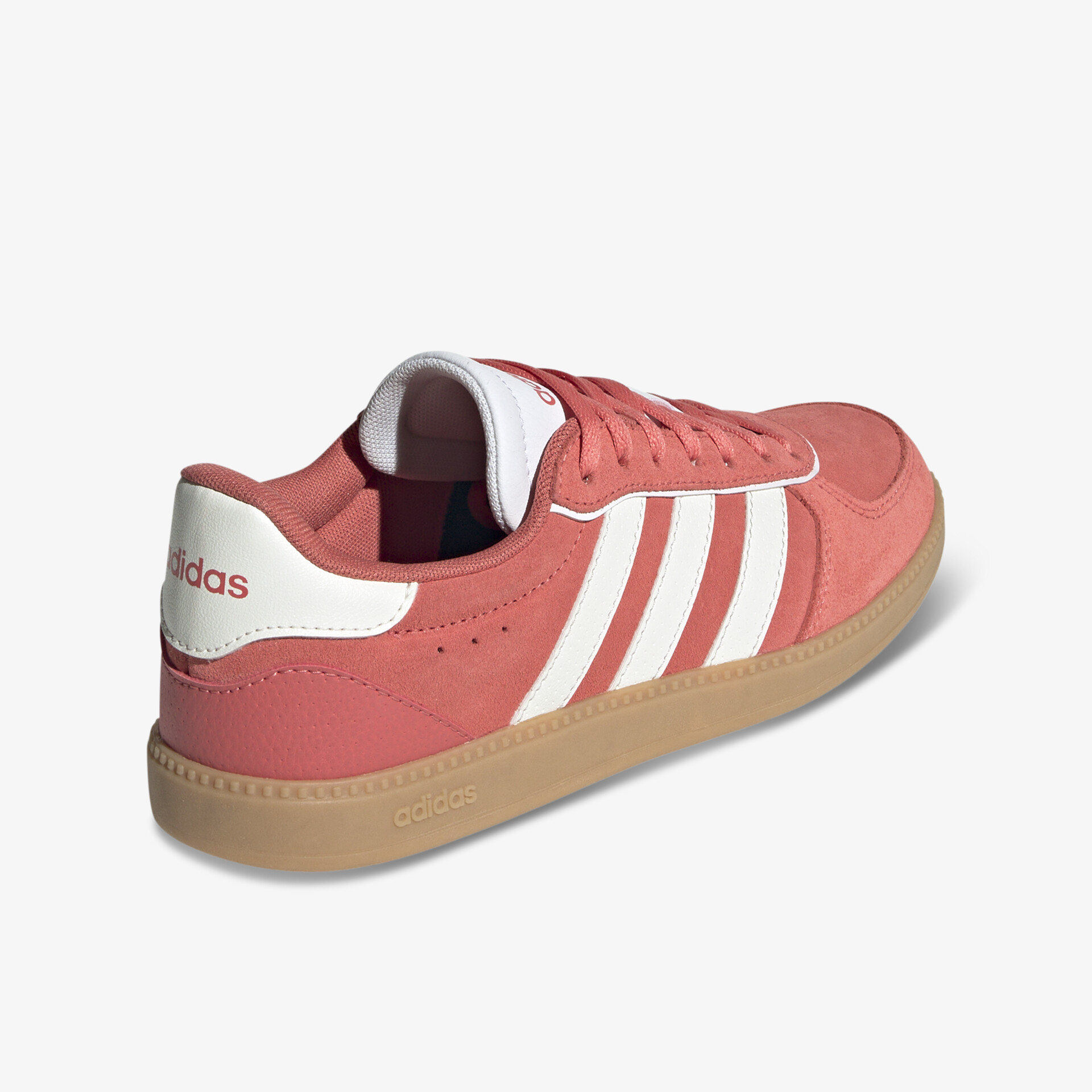 Sportlicher rosaroter Schuh mit weißer Markenoptik, atmungsaktivem Material und leichter, langlebiger Sohle seitlich sichtbar