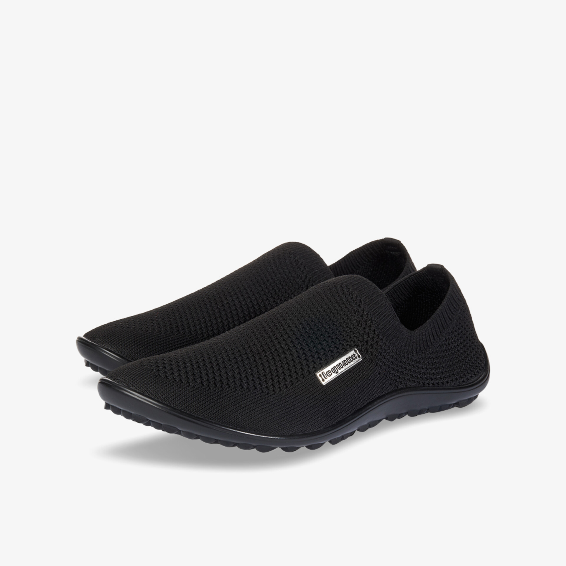 Schwarze Slip-On Schuhe mit komfortablem und atmungsaktivem Design für vielfältigen Einsatz.