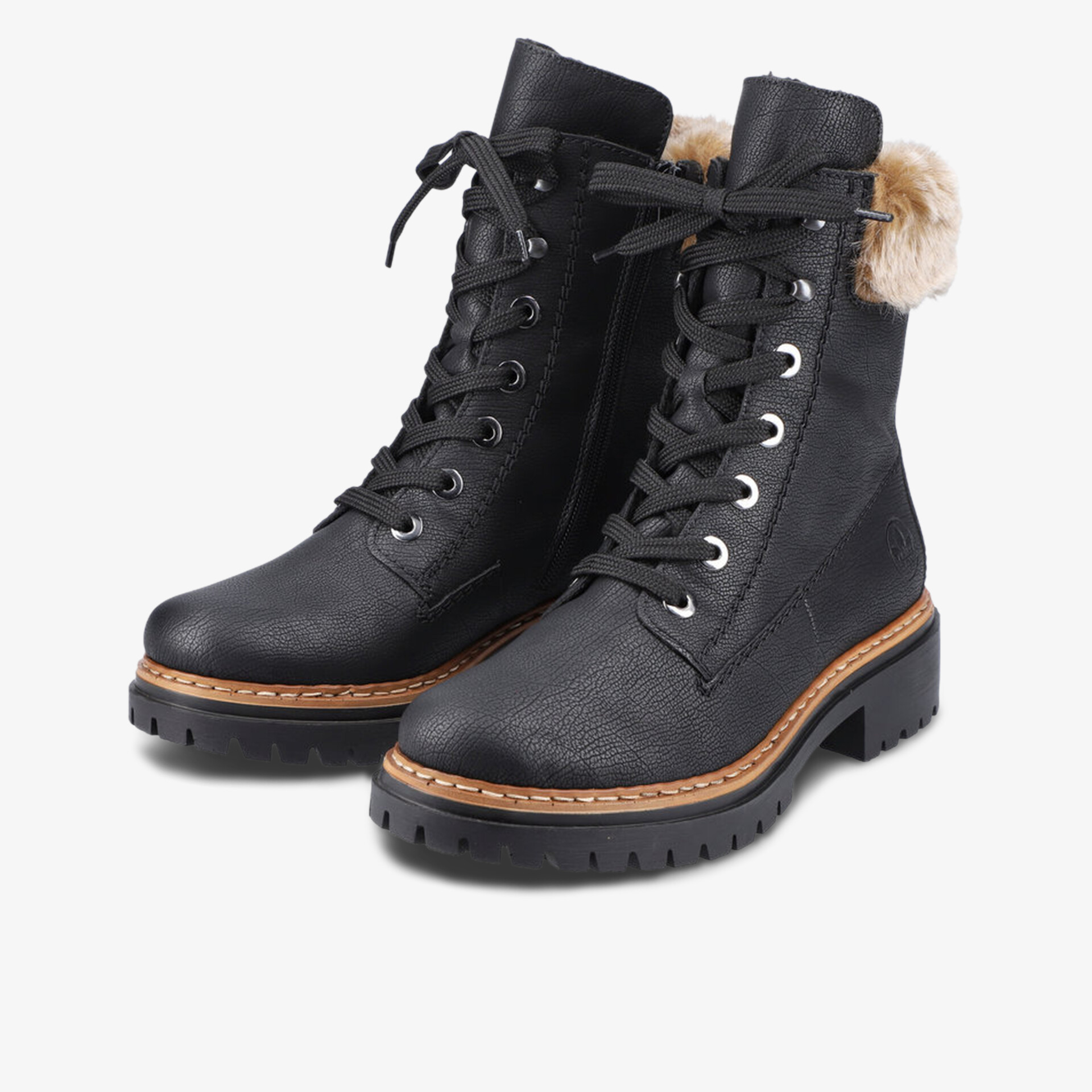 Warme Schnürboots mit weichem Fellfutter, robustem Blockabsatz und profilierter Laufsohle für sicheren Halt