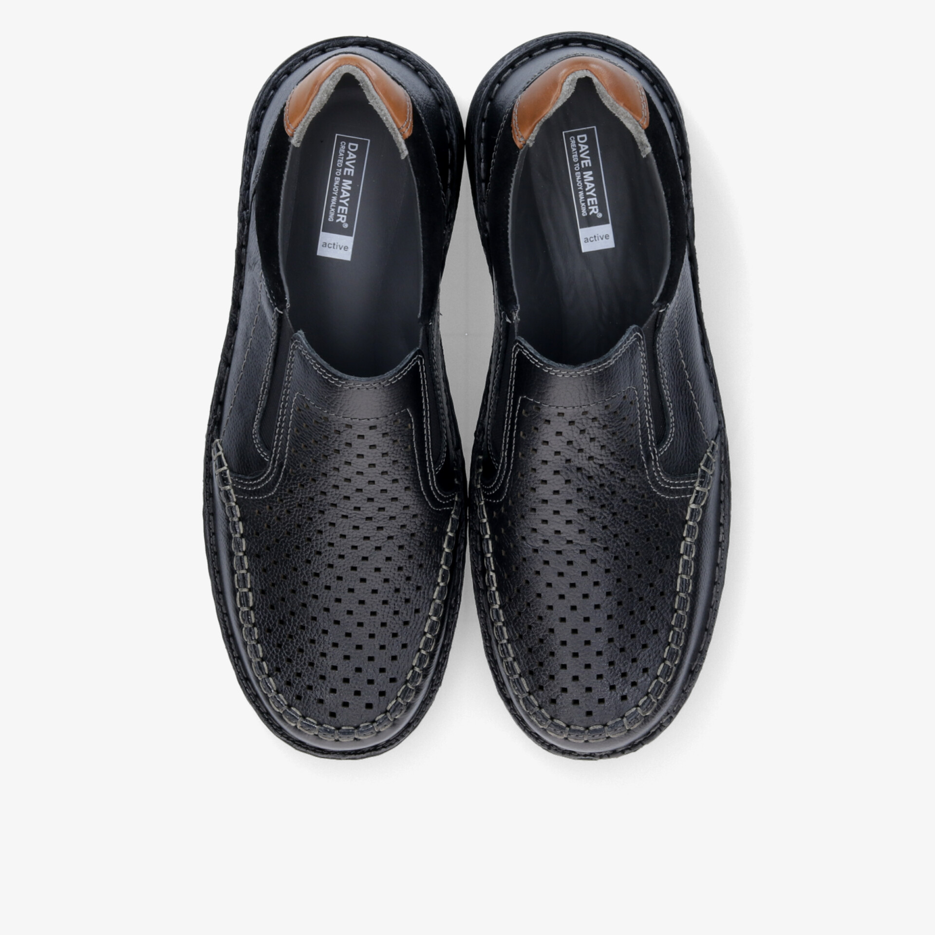 Schwarze, perforierte Lederschuhe als Paar mit hoher Atmungsaktivität und komfortablem Design