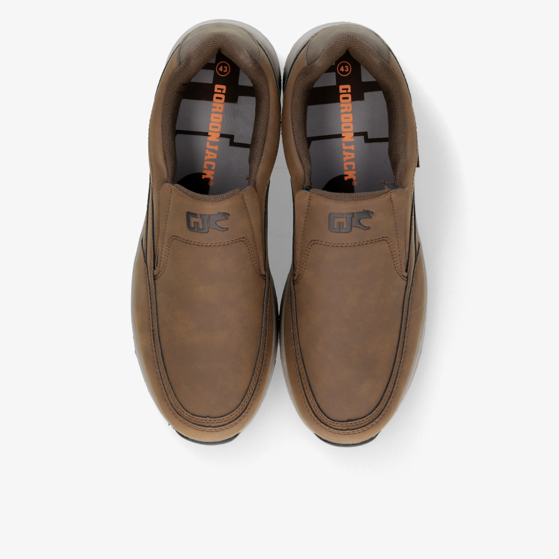 Braunes Paar Leder-Slipper mit komfortablem Design und hochwertiger Verarbeitung, geeignet für Alltag und Büro