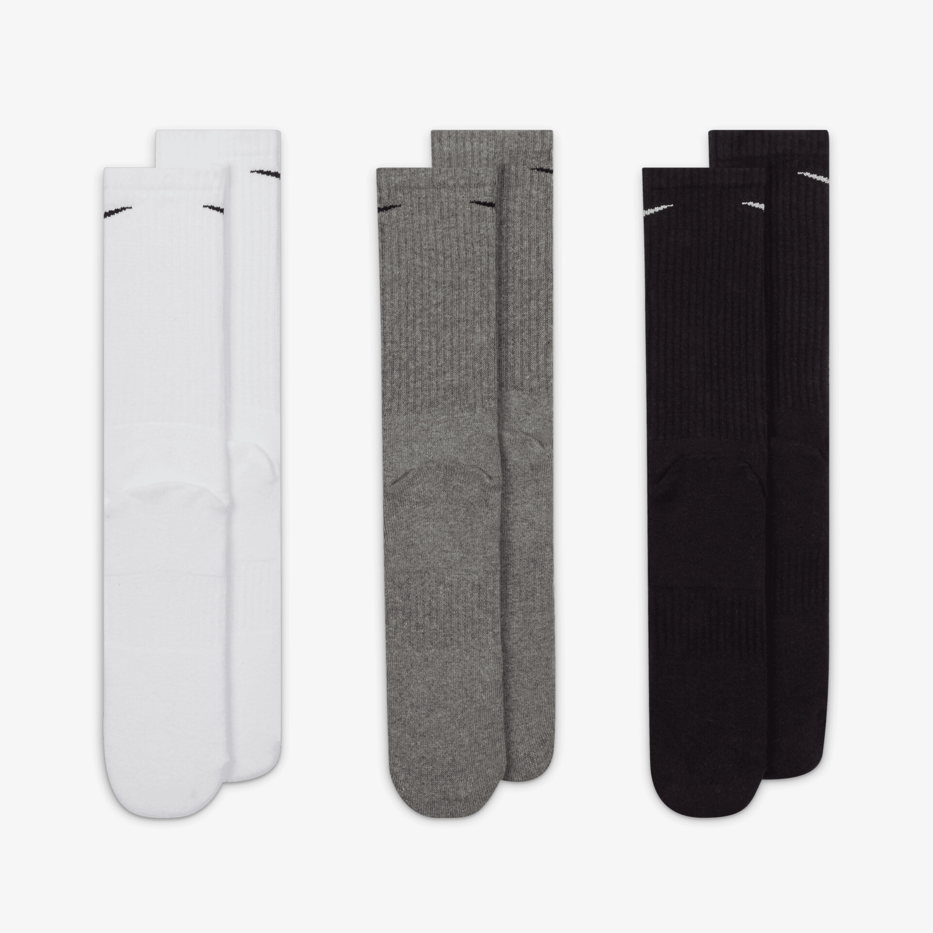 Klassische Socken in Weiß, Grau und Schwarz, ideal für den täglichen Komfort und vielseitigen Einsatz.