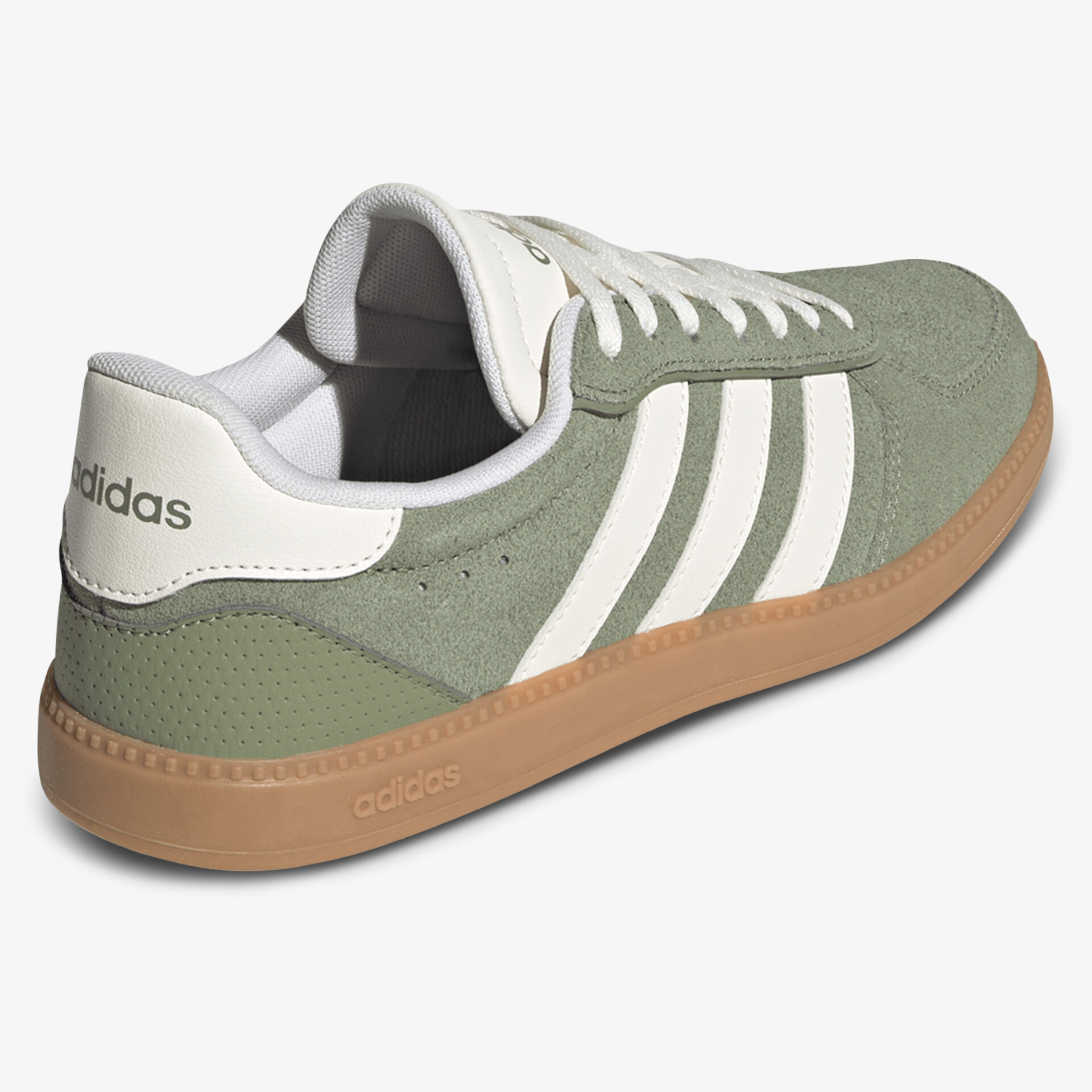 Seitliche Ansicht eines klassischen Sneakers mit atmungsaktivem Obermaterial und rutschfester Gummisohle