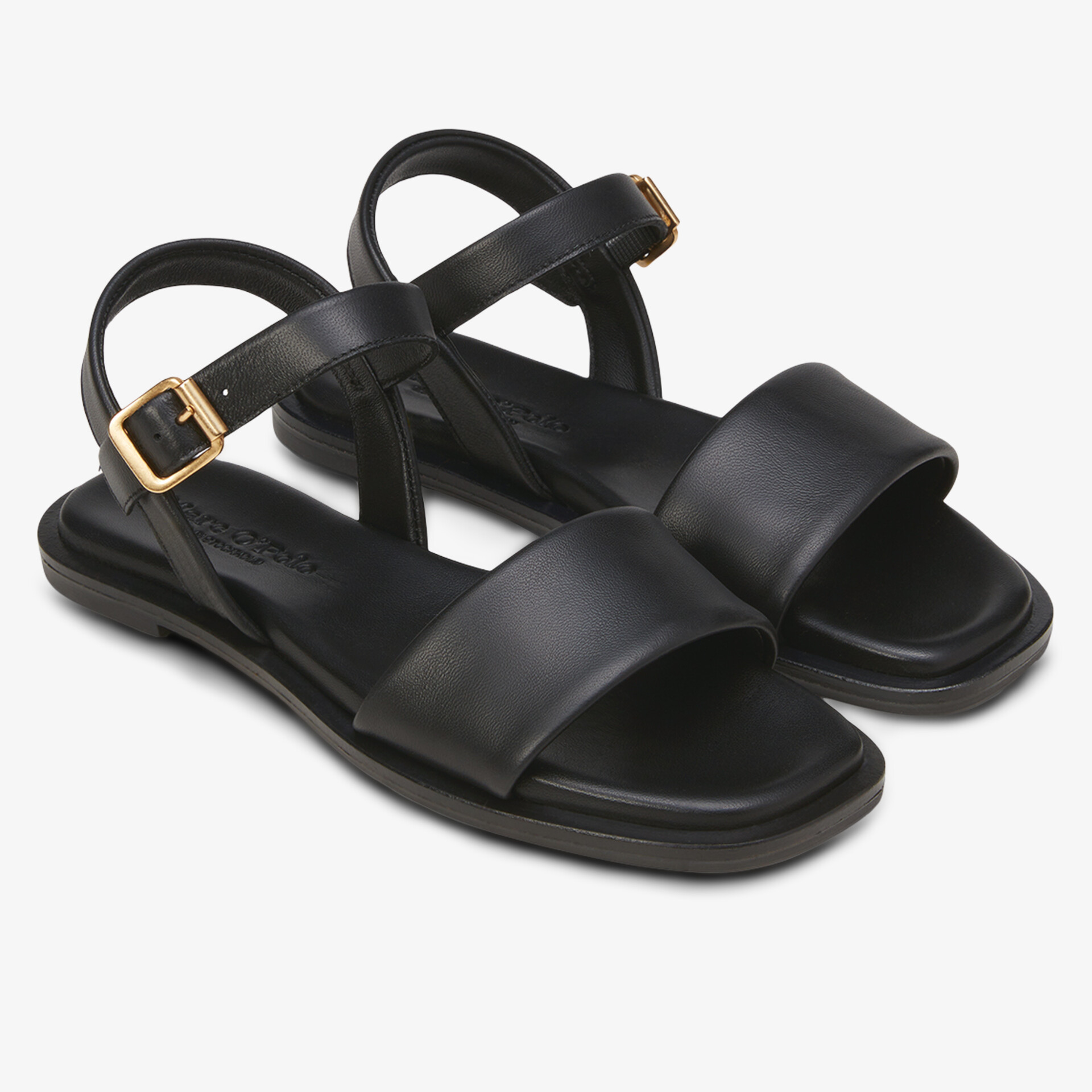 Elegante schwarze Sandalen mit verstellbarem Riemen und bequemer flacher Sohle
