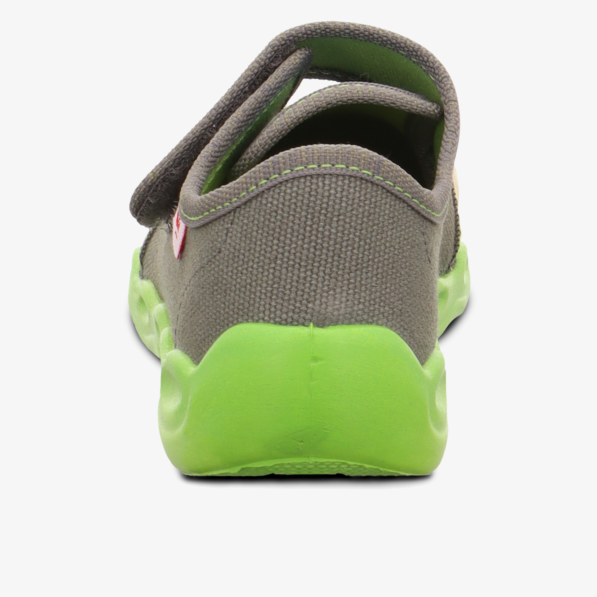 Robuster Schuh mit grüner Gummisohle, rückansicht, bequem und rutschfest für den Alltag