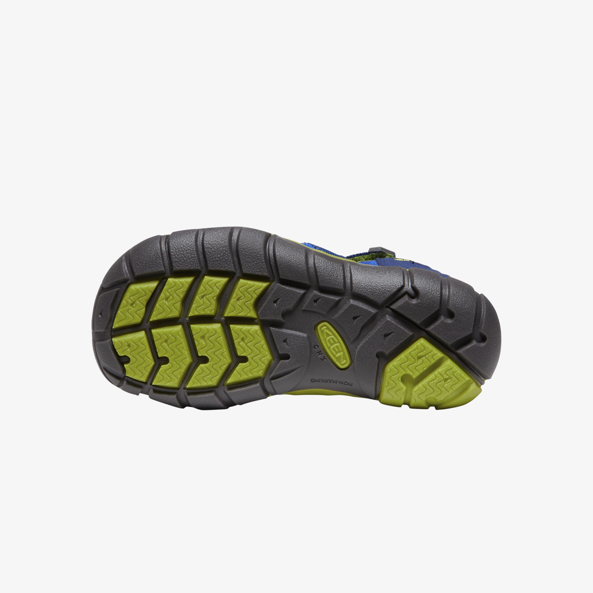 Robuste, rutschfeste Sohle eines Outdoor-Schuhs für zuverlässigen Halt und Langlebigkeit.