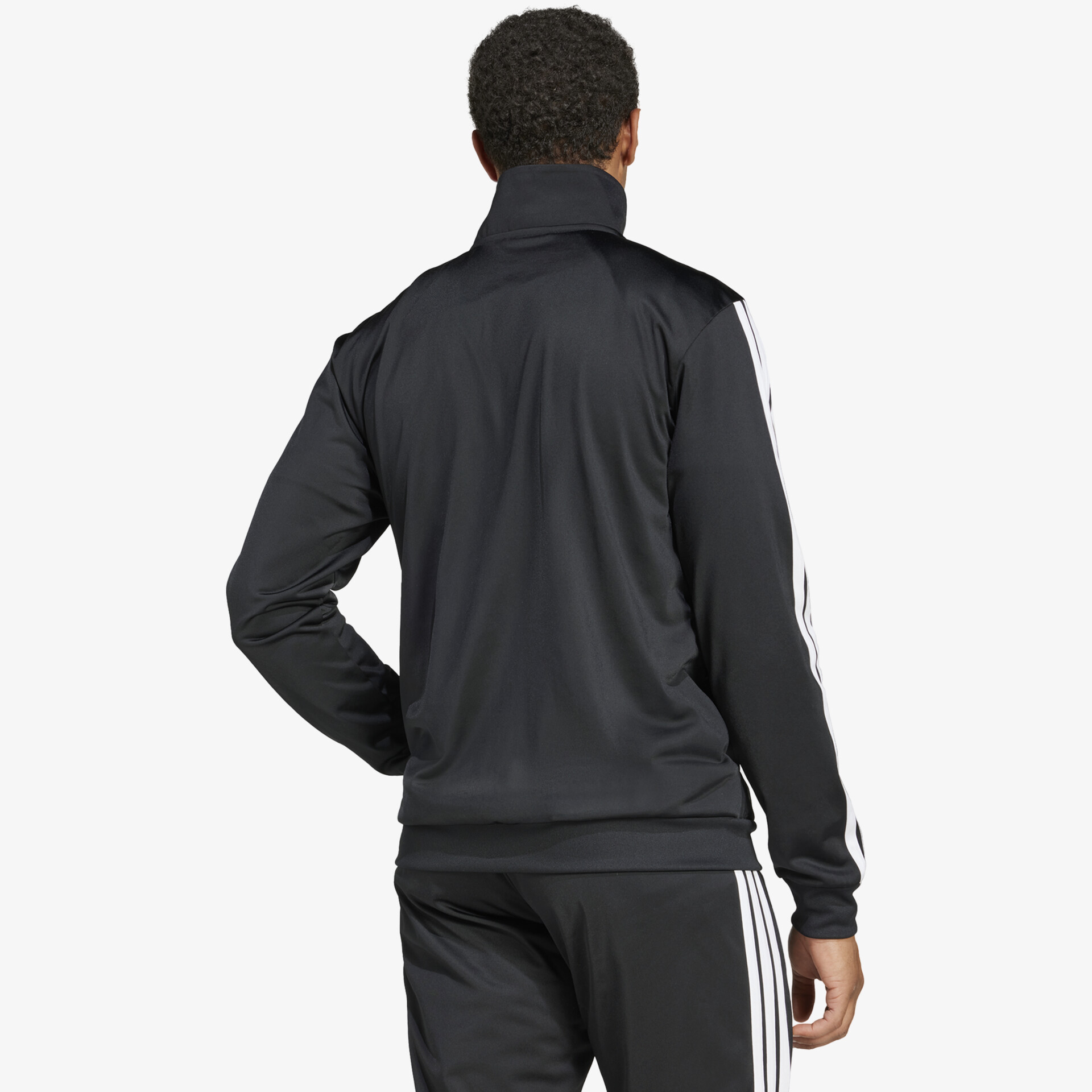 Sportliche schwarze Trainingsjacke in Rückansicht mit Stehkragen und Reißverschluss für optimale Bewegungsfreiheit