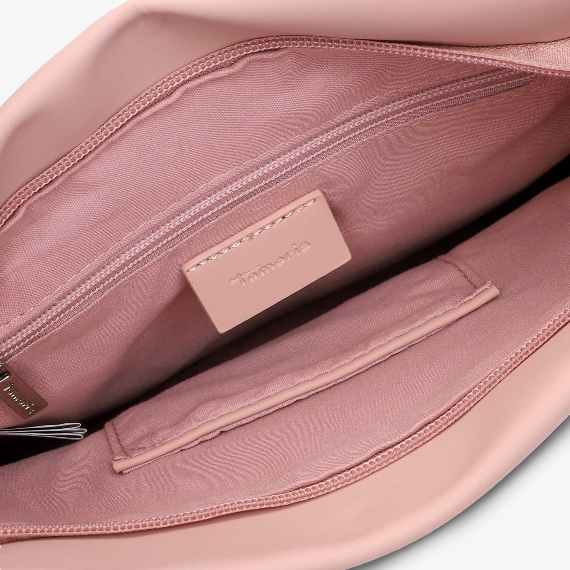 Innenraum mit Reißverschlussfach in weichem rosa Material, geräumige Aufteilung, hochwertige Verarbeitung