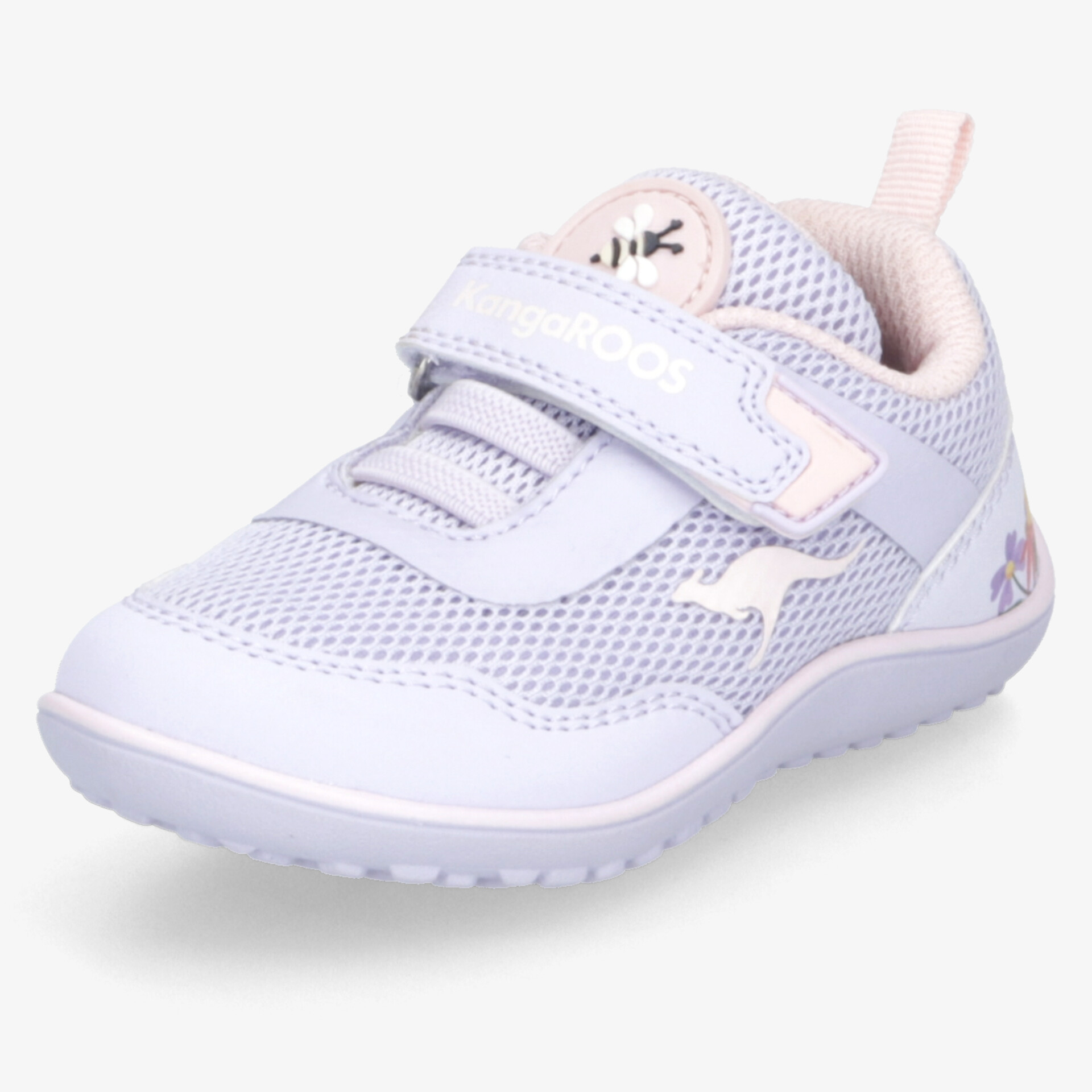 Moderner lila Sneaker mit Klettverschluss und atmungsaktivem Obermaterial für optimalen Tragekomfort.