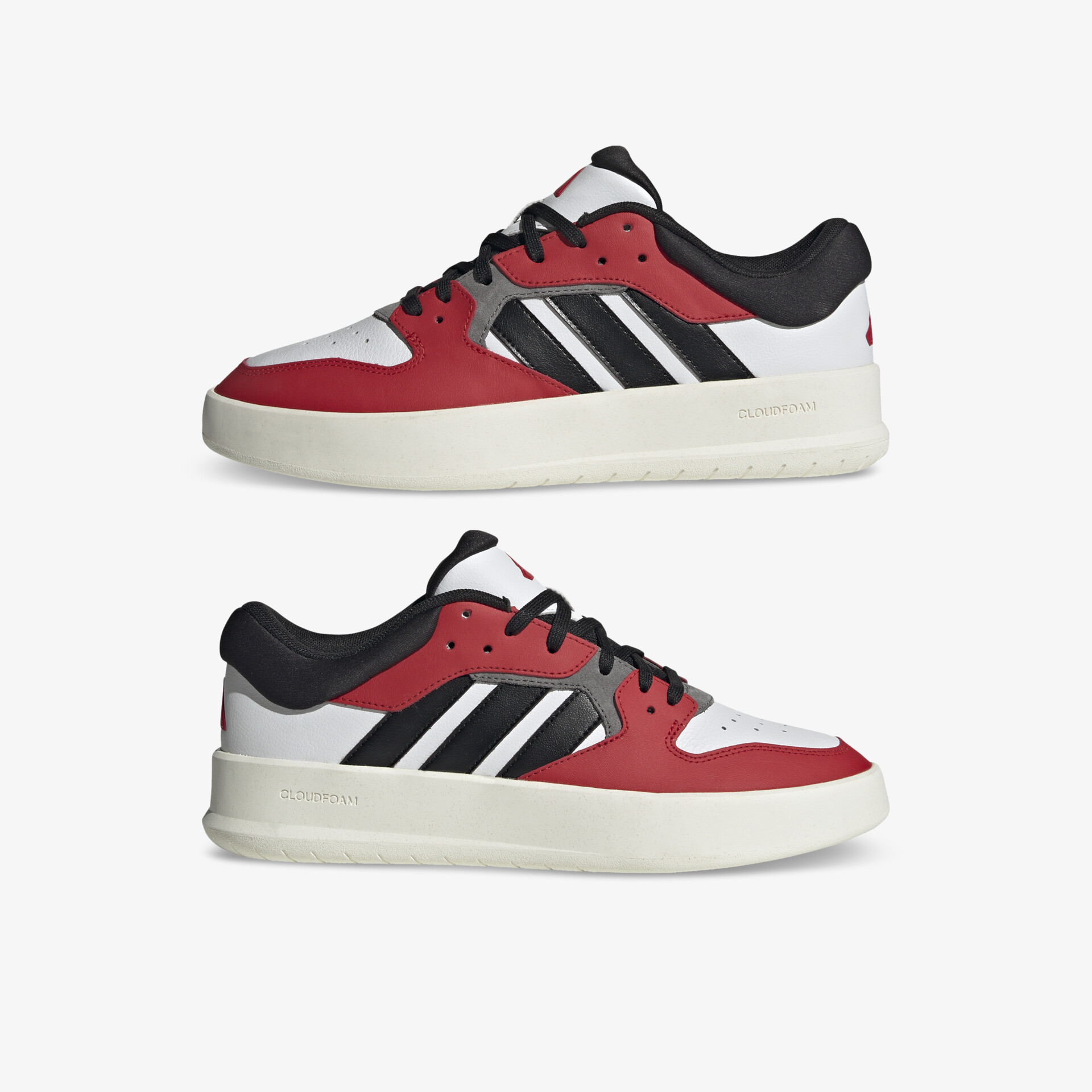 Seitenansicht eines roten und schwarzen Sportschuhs mit robuster Sohle und modernem, bequemem Design