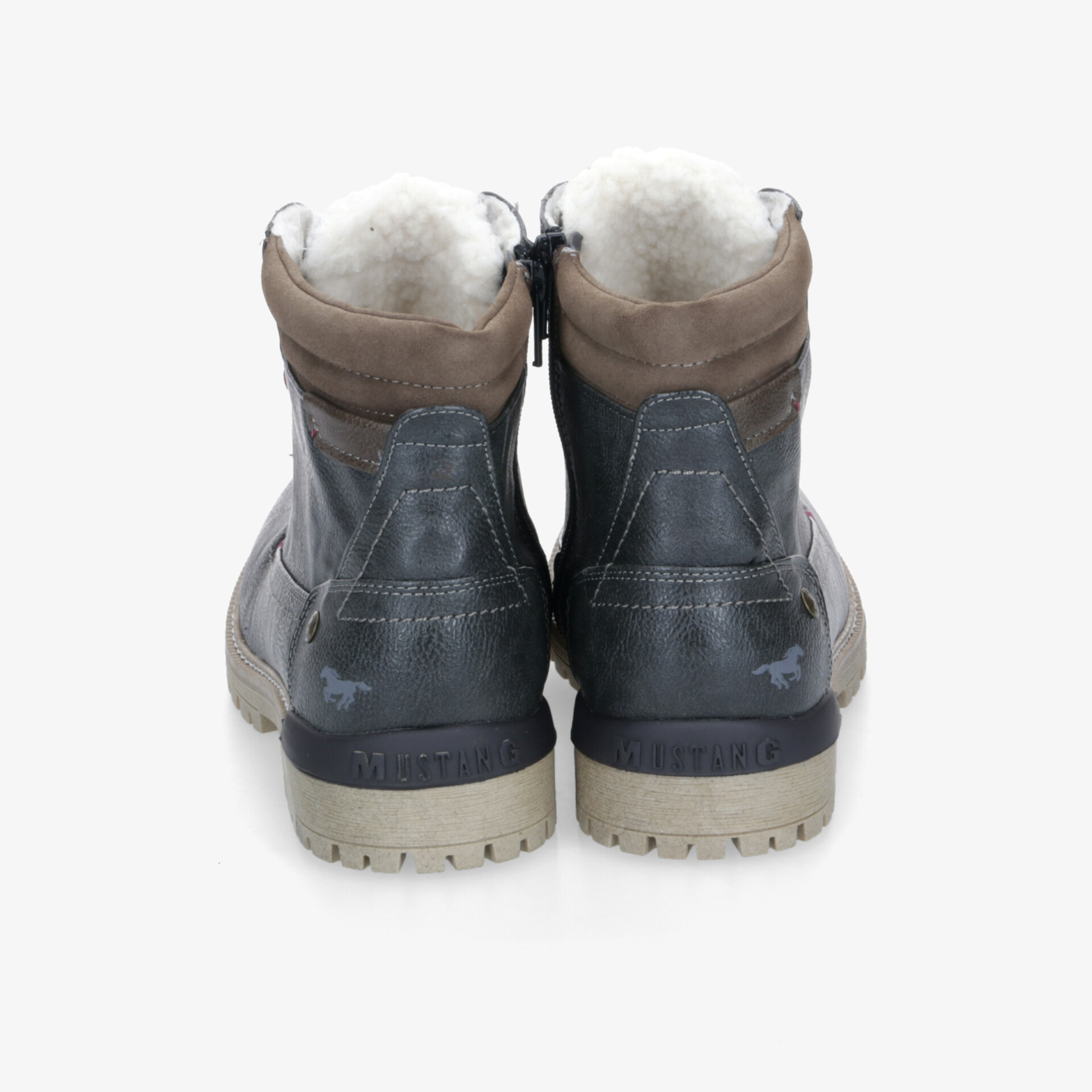 Robuste Schuhe mit warmer Innenfütterung und praktischen Reißverschlüssen, ideal für kalte und nasse Bedingungen