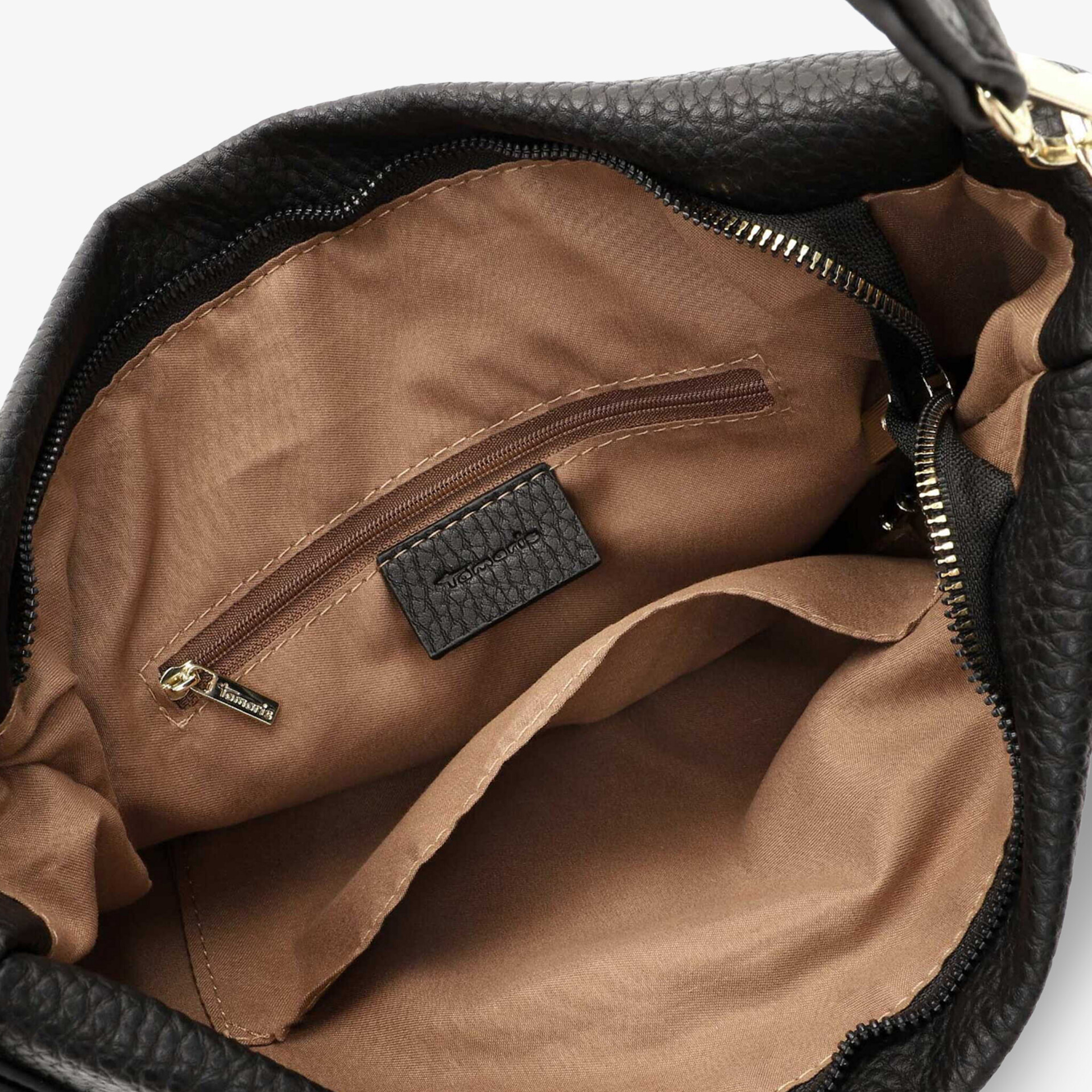 Detailansicht des geräumigen, gut organisierten Innenfachs mit Reißverschluss und hochwertigem Innenfutter der Tasche