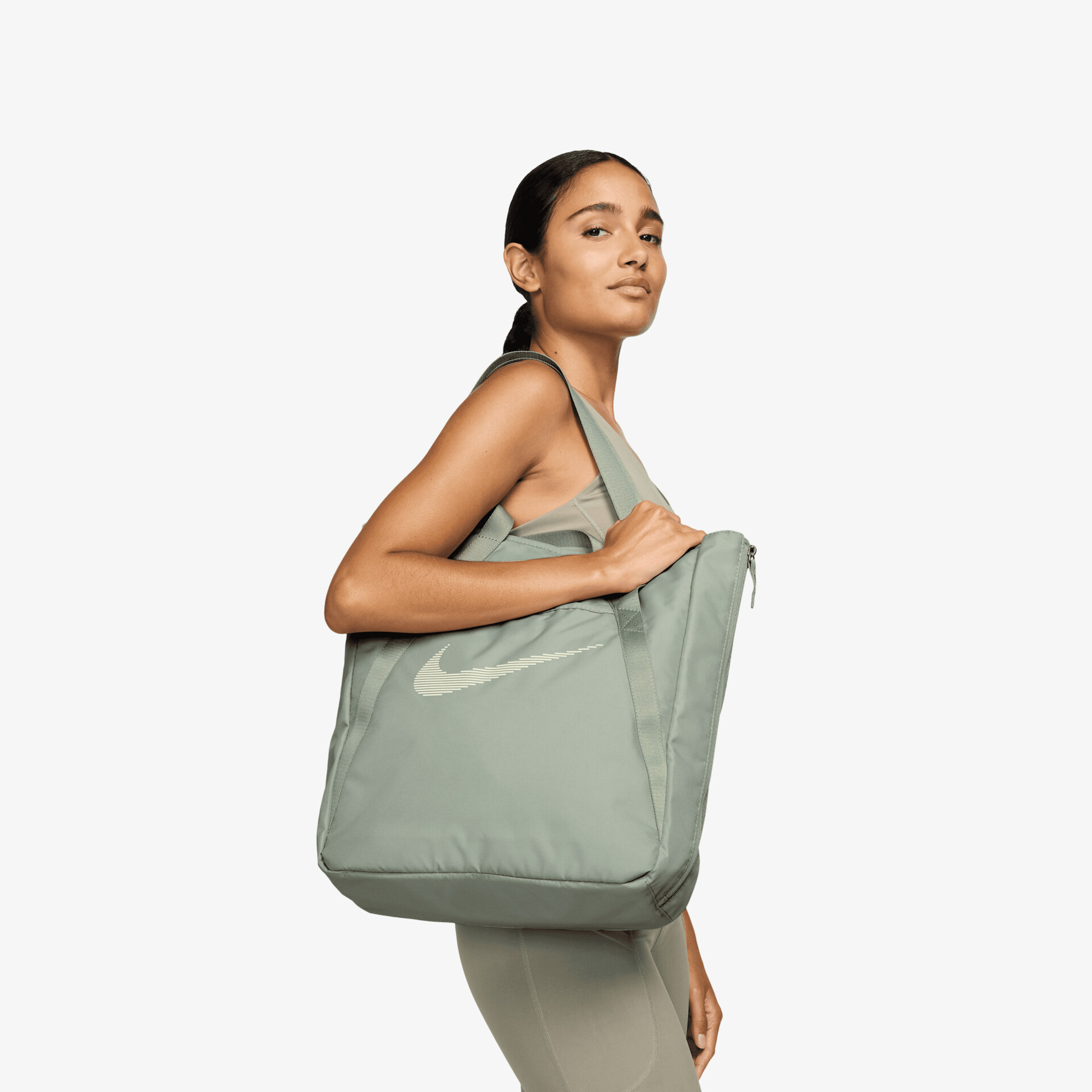 Seitenansicht einer modernen grauen Tasche mit großem Fassungsvermögen, leicht und bequem zu tragen