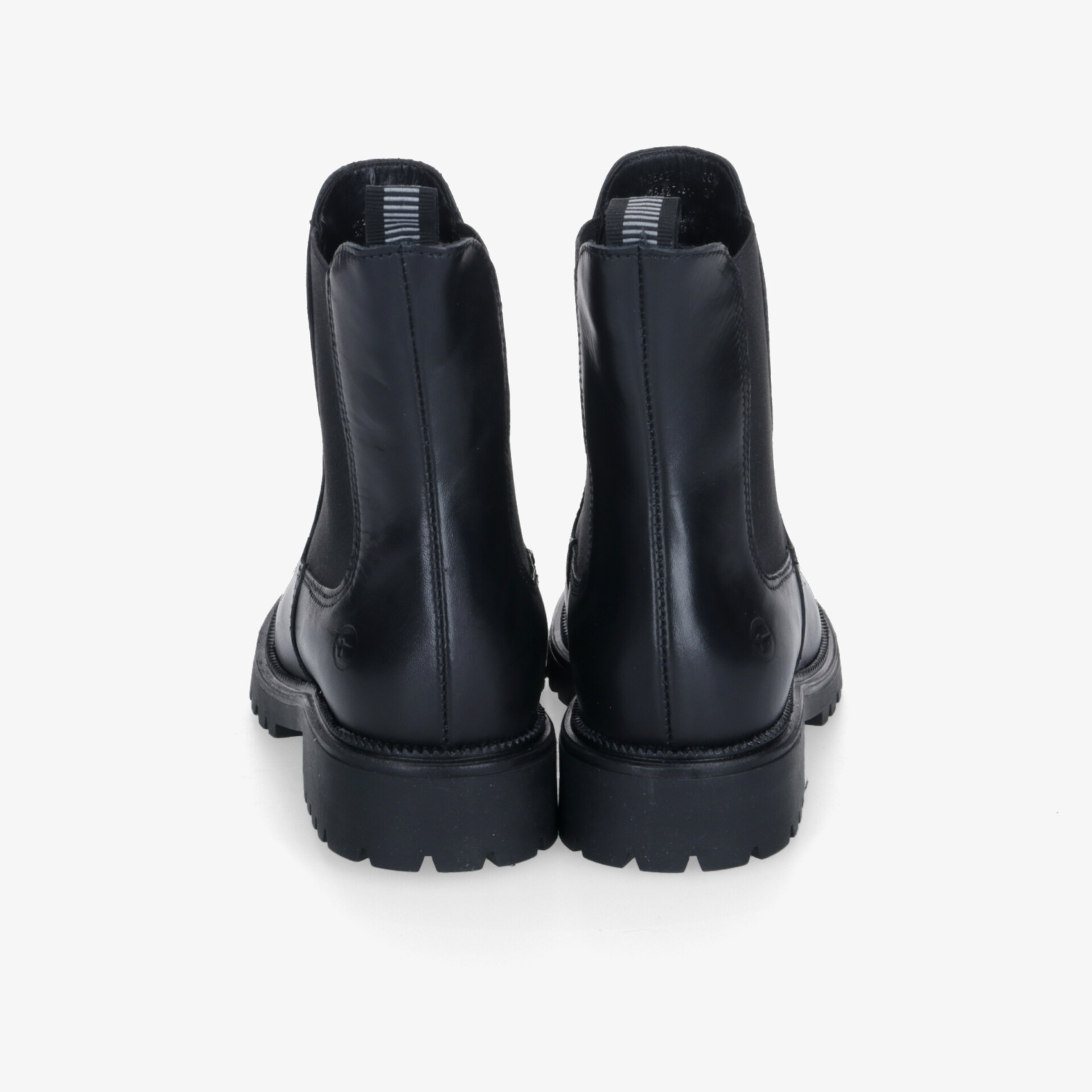 Schwarze robuste Boots mit dickem Absatz und rutschfester Sohle in klarer Rückansicht