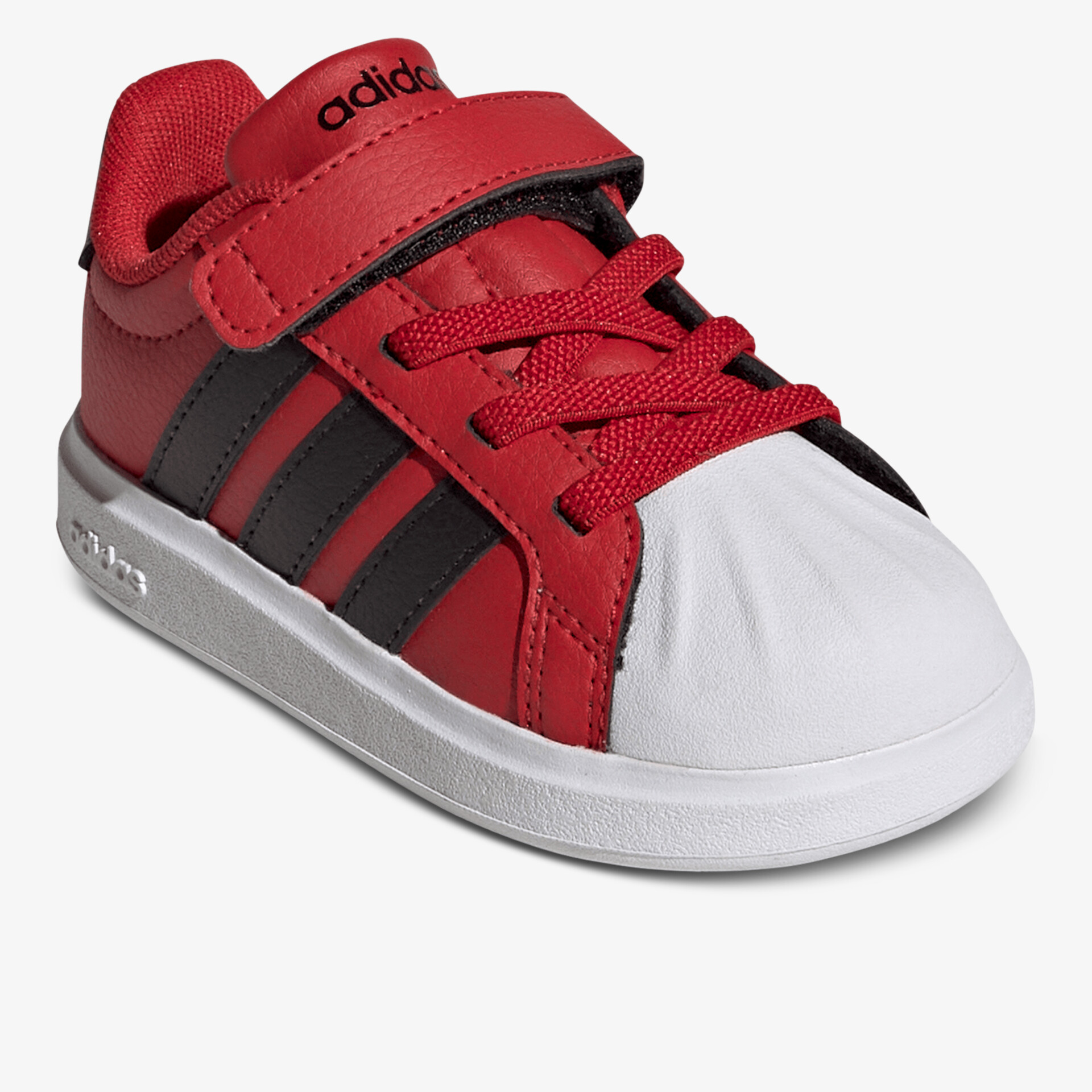 Roter Sportschuh mit robustem Zehenschutz und praktischem Klettverschluss für sicheren Halt