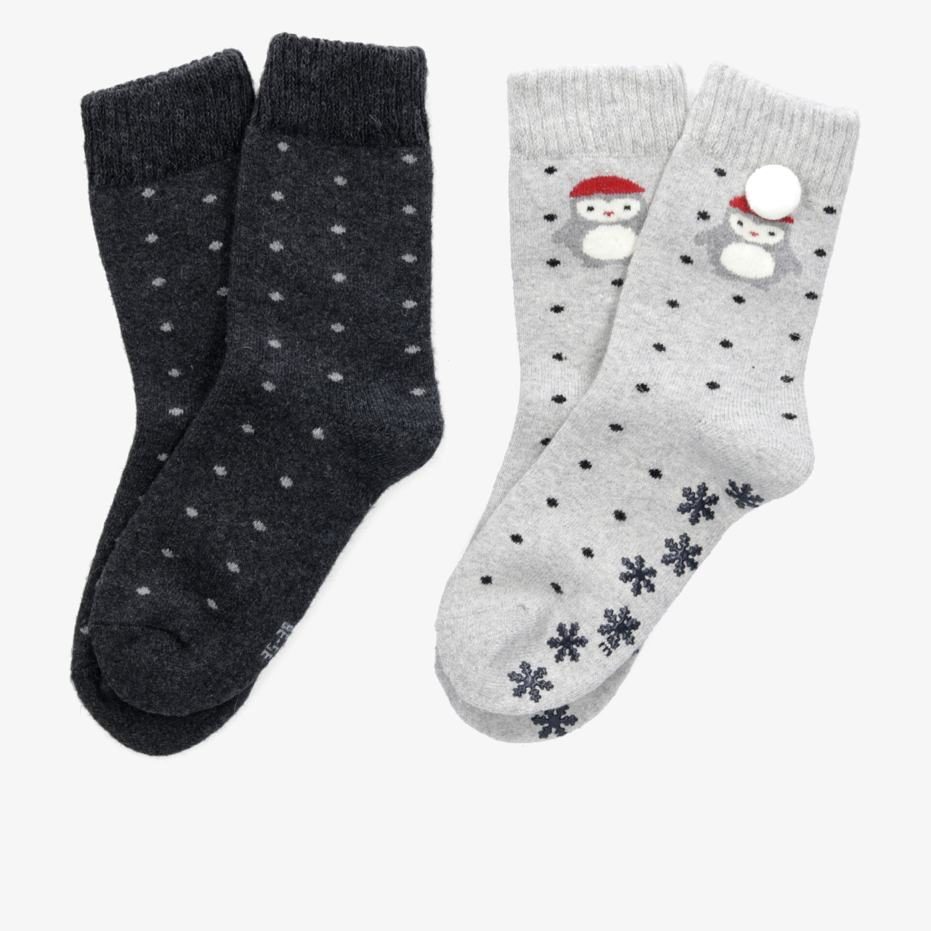 Weiche Wintersocken mit Punkten und Schneemannmotiv in zwei Farben, ideal für kalte Tage.