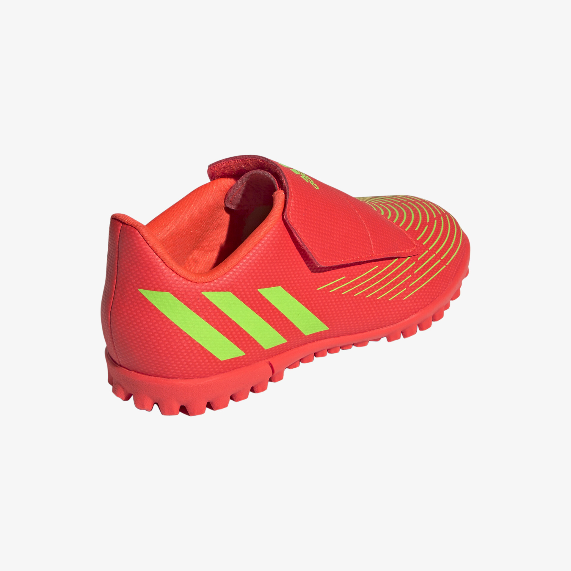Kompakte Fußballschuhe in leuchtendem Rot mit neonfarbenem Detail, ideal für hohen Komfort und Stabilität.