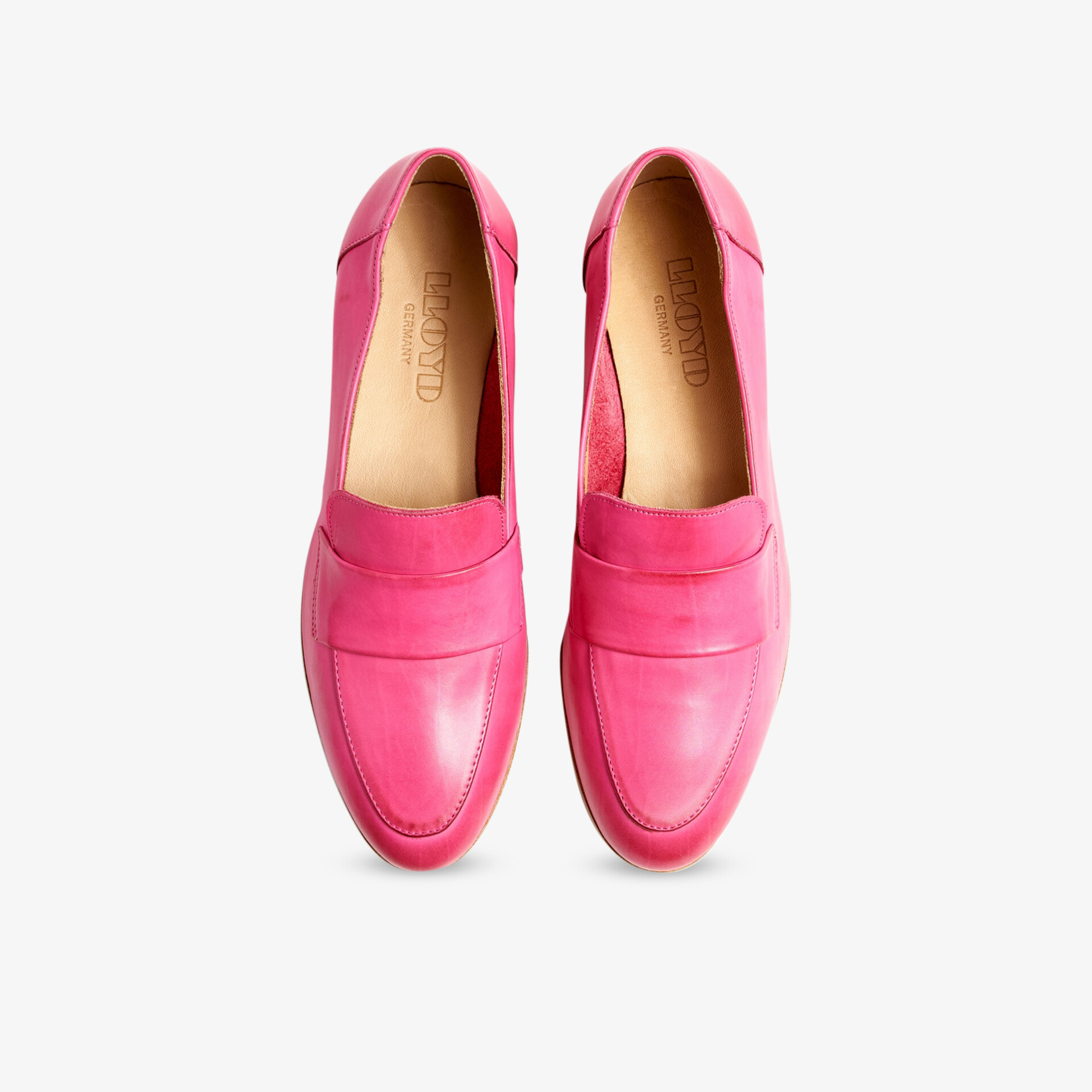 Modische rosa Loafers mit glattem Finish, komfortabel und vielseitig für jeden Anlass geeignet.