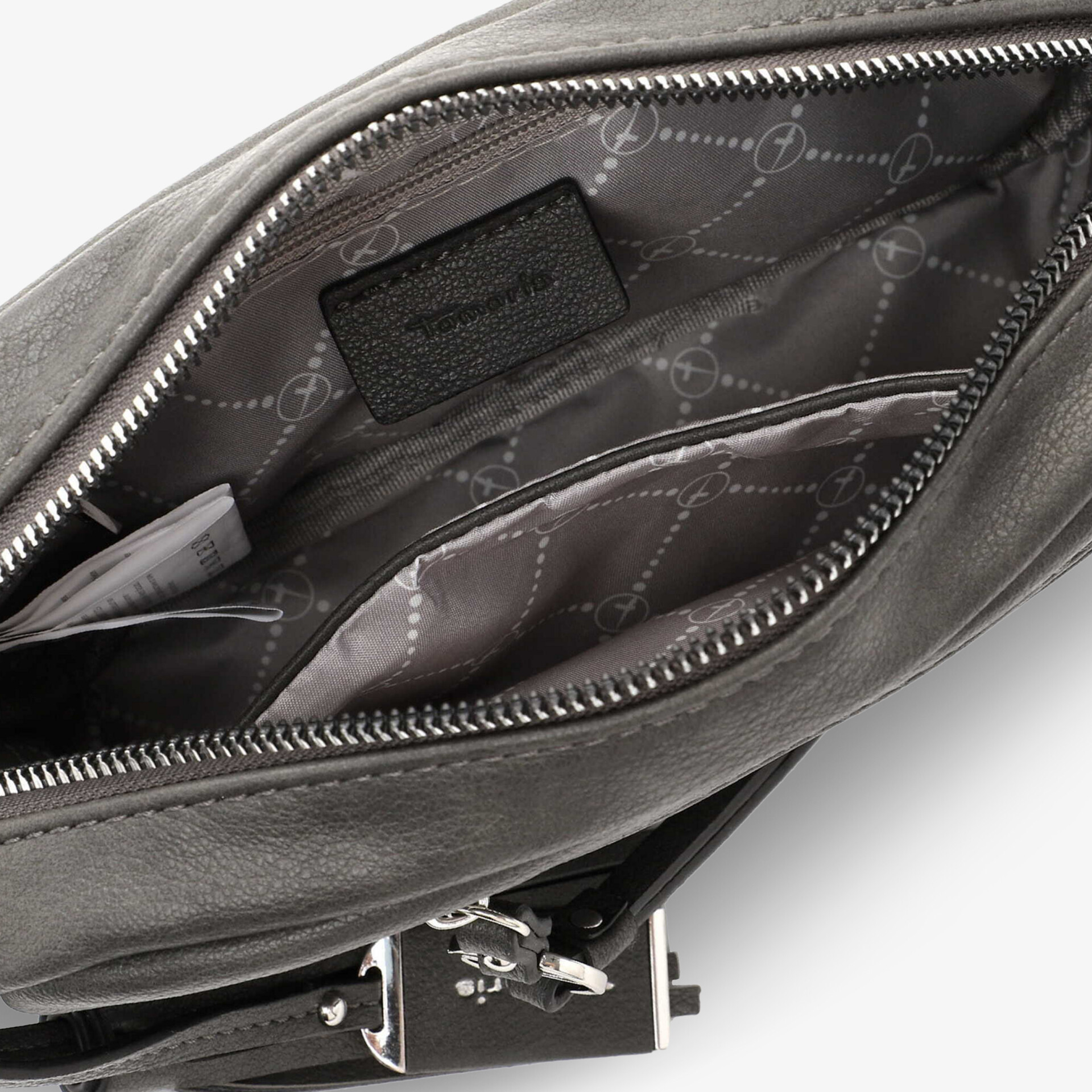 Detailaufnahme des robusten Reißverschlusses und geräumigen Innenfachs mit strukturiertem Innenfutter