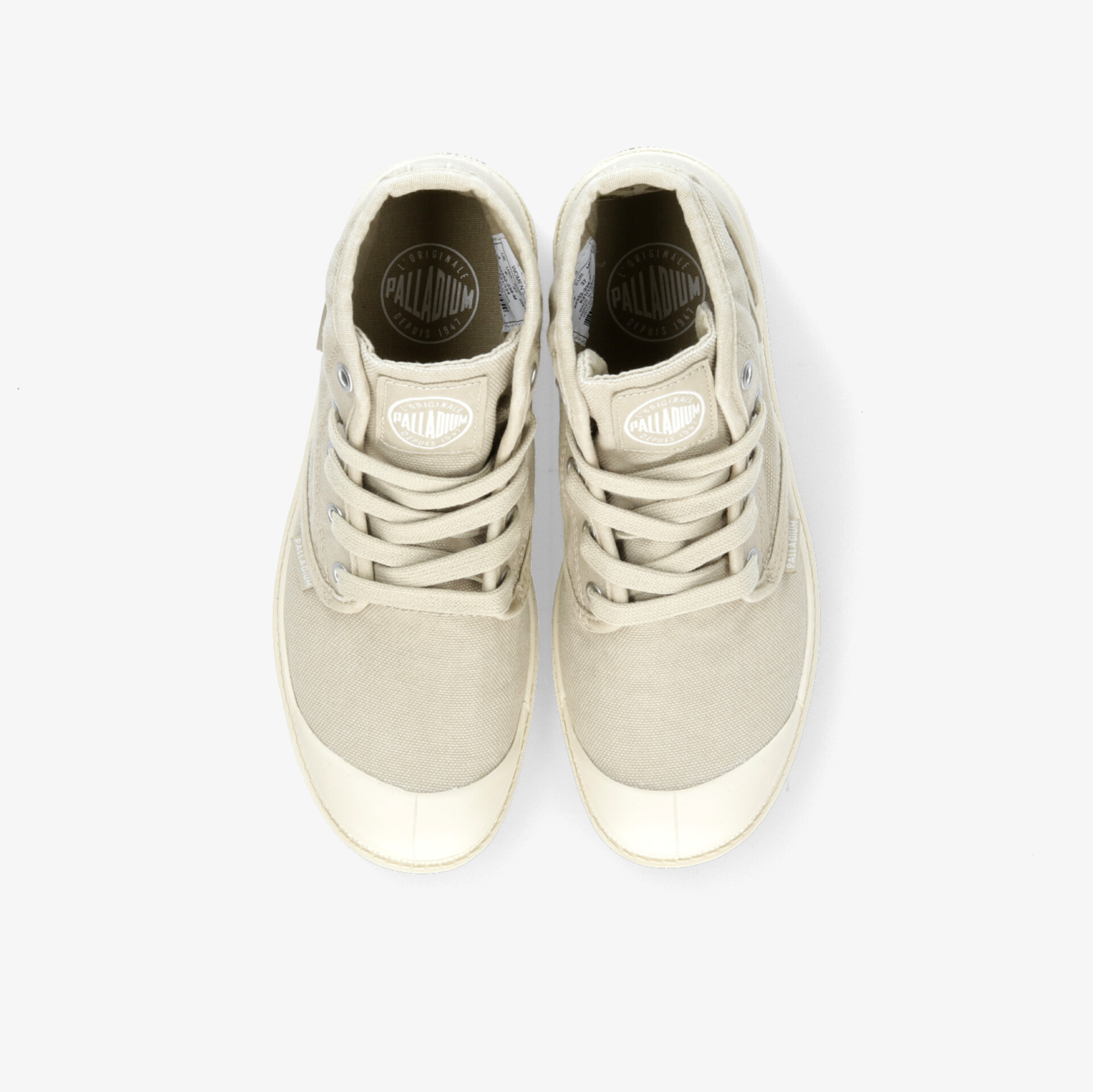 Bequeme beige Sneaker mit Schnürung und rutschfester Sohle für vielseitigen Style und komfortablen Sitz.