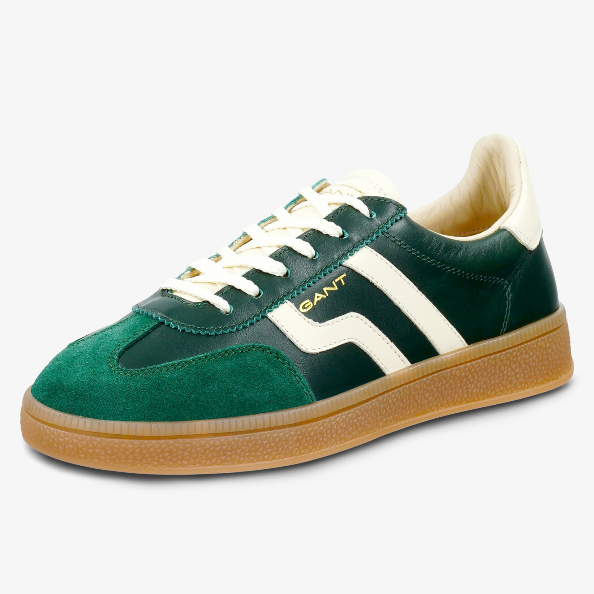Grüner Sneaker mit weißen Akzenten und brauner Gummisohle, sportlich und komfortabel gestaltet