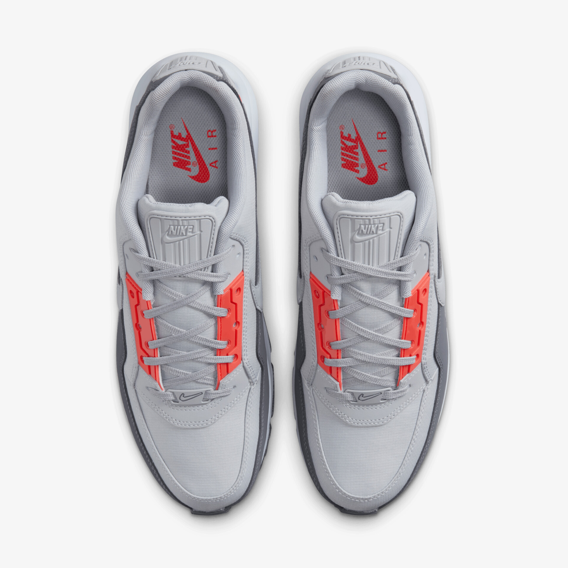 Robuste graue Sportschuhe mit roten Akzenten, gepolstert und bequem, leichte Sohle für optimalen Tragekomfort