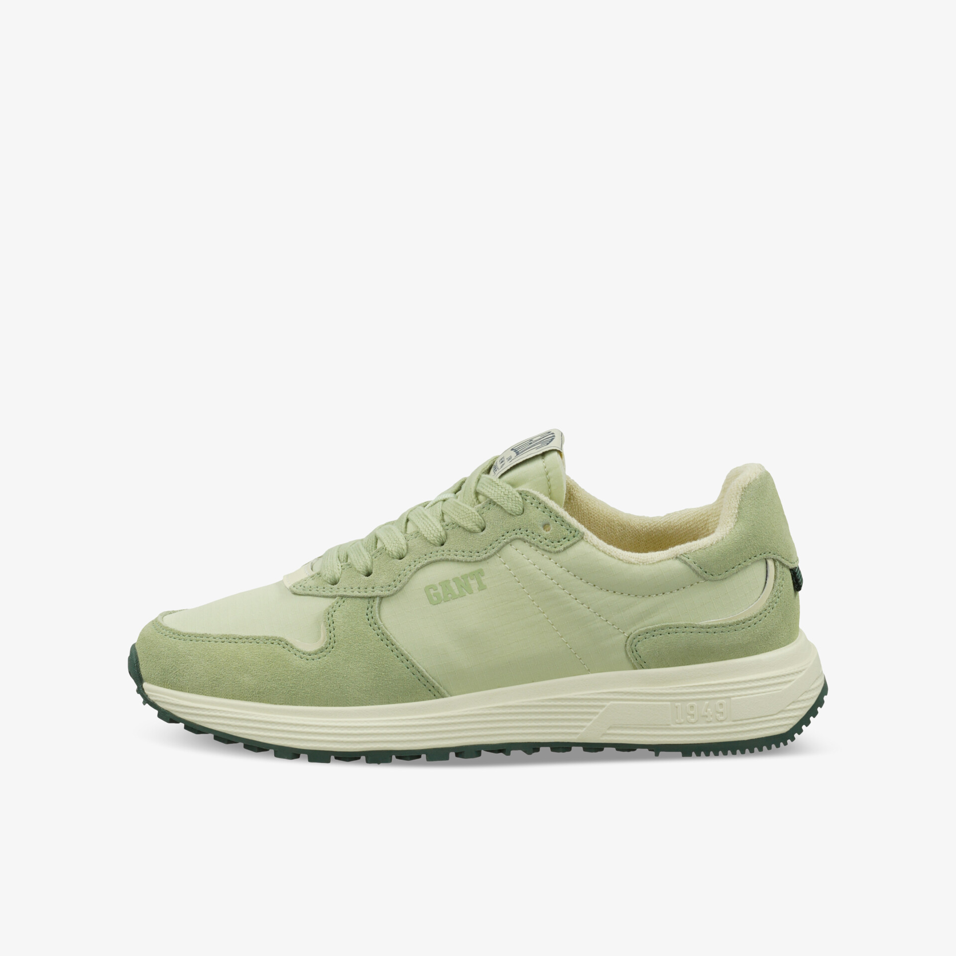 Moderner grüner Sneaker mit gepolstertem Schaft und rutschfester Sohle für hohen Tragekomfort