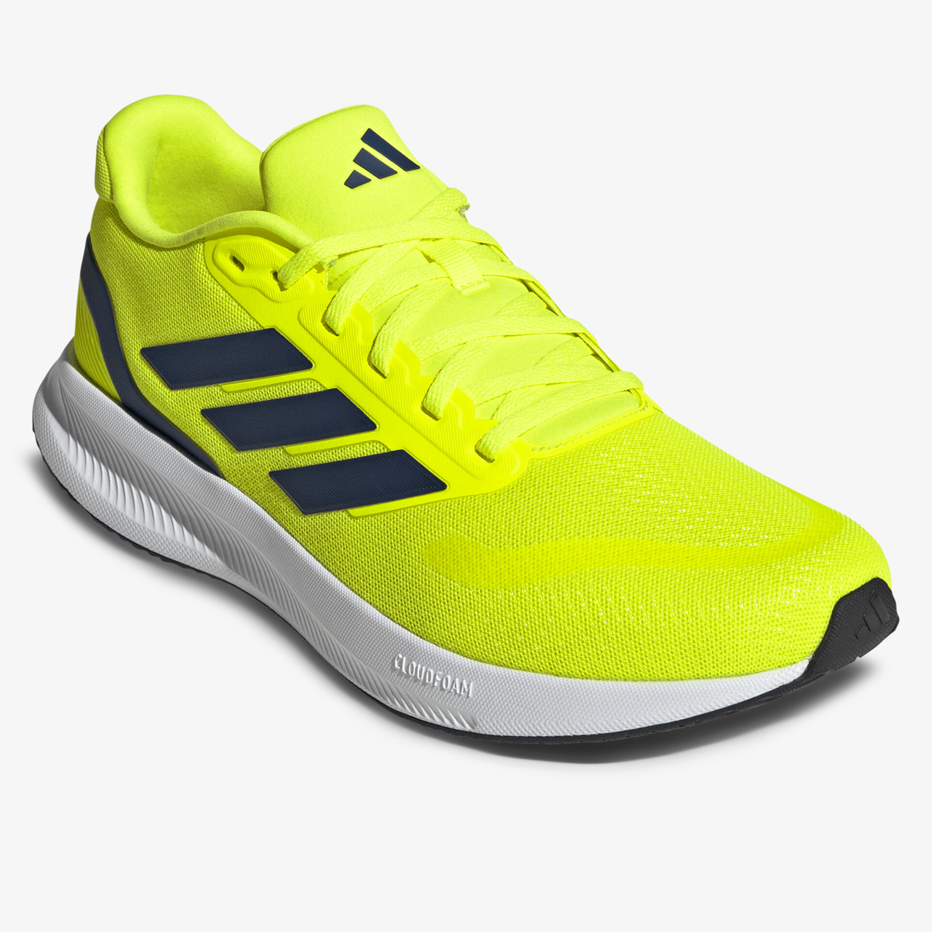 Leichtes, atmungsaktives Sportschuh-Modell in kräftigem Gelb mit stabiler Laufsohle und schnellem Verschluss