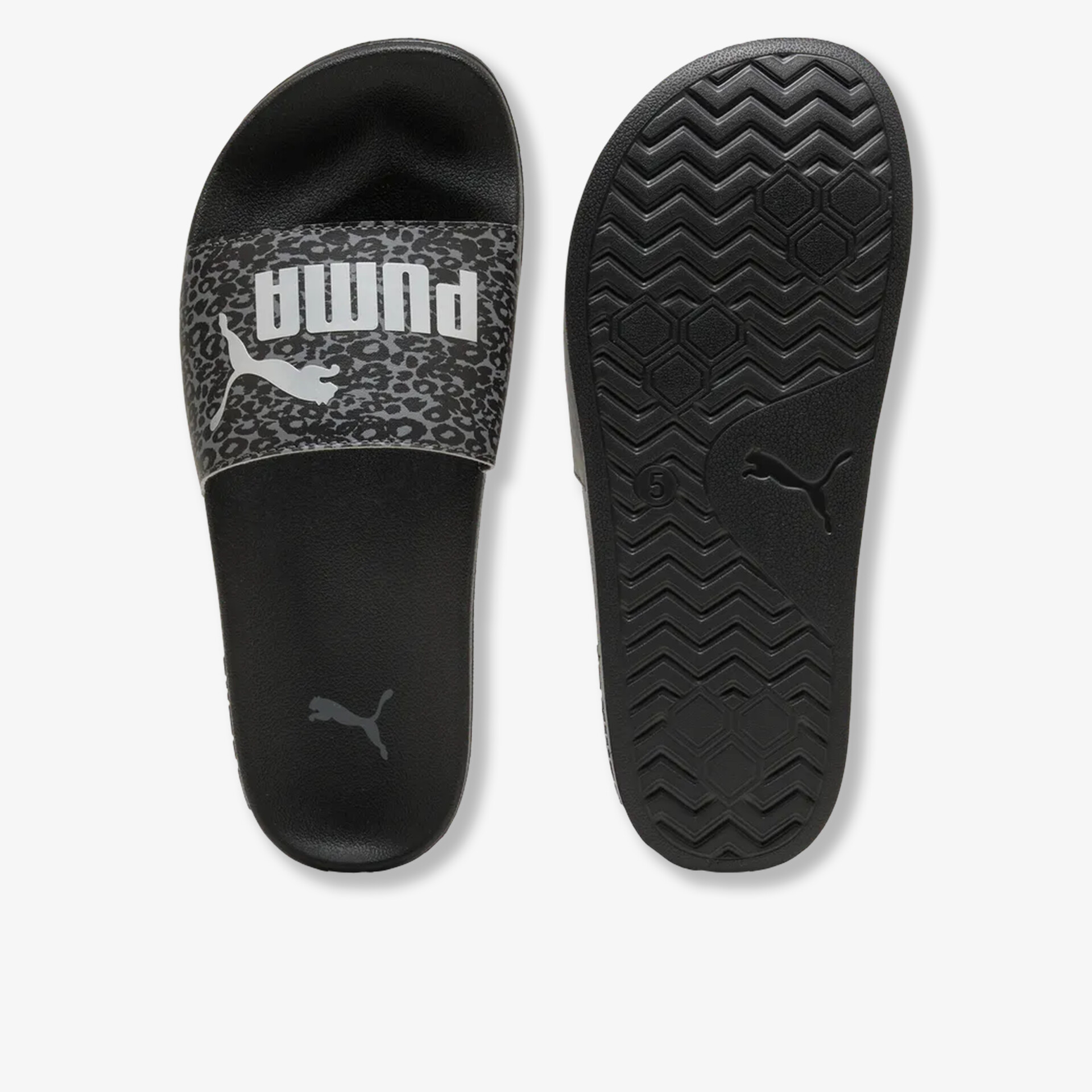 Schwarze Puma Badeschuhe mit bequemer Passform und rutschfester Sohle in Seiten- und Unteransicht