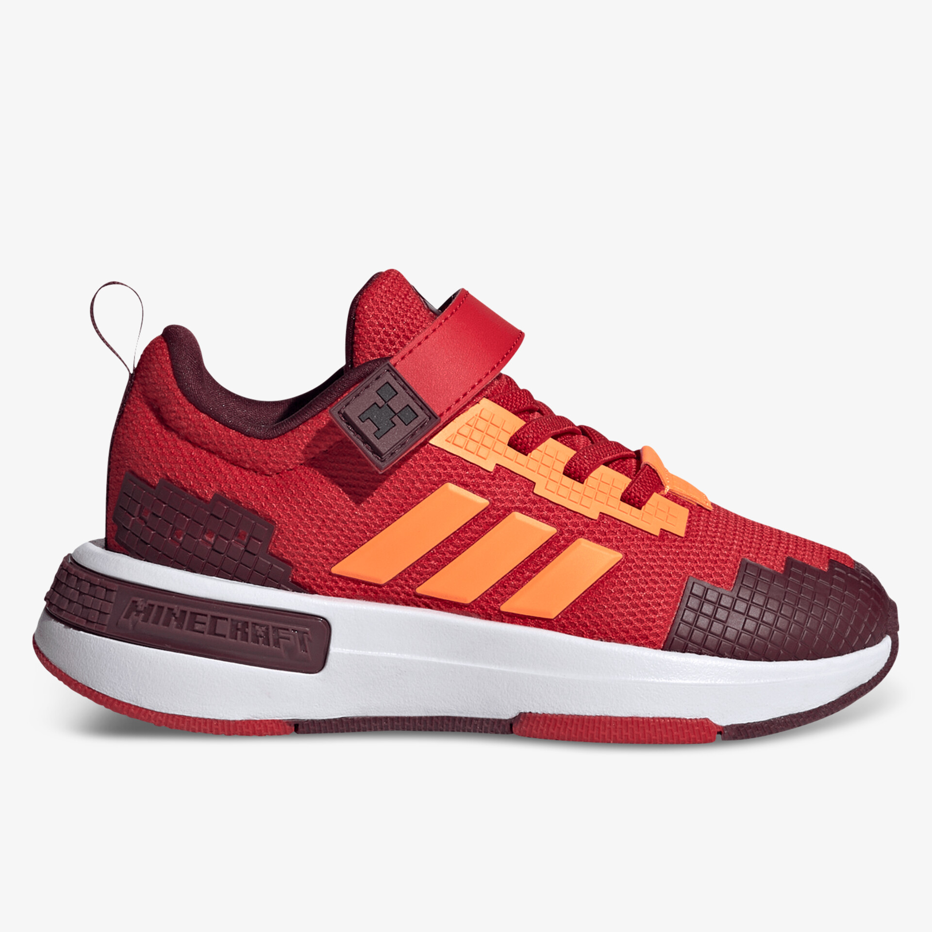 Leichter sportlicher Schuh in Rot mit Klettverschluss und robuster weißer Sohle, komfortabel und atmungsaktiv