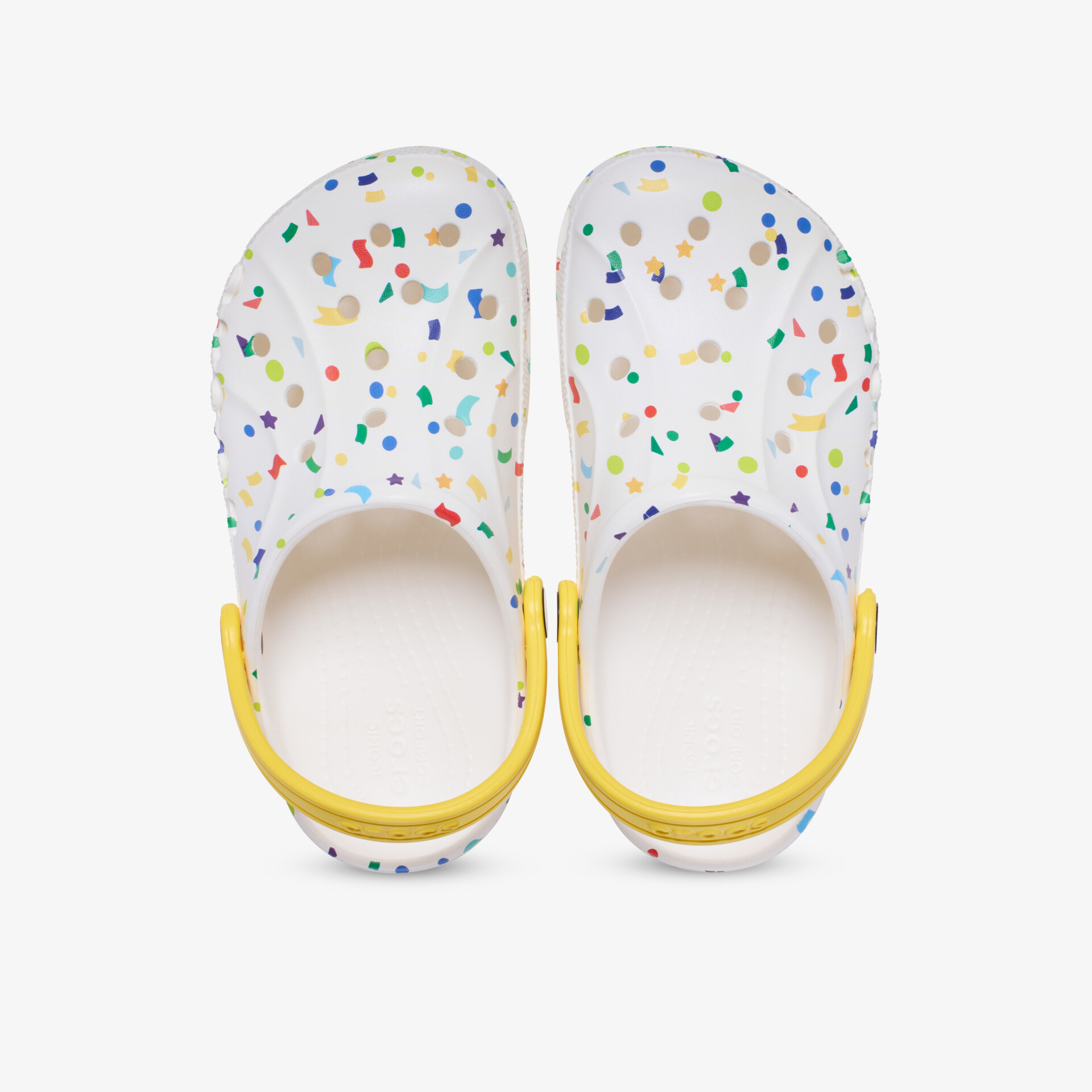 Leichte bunte Clogs mit bequemen gelben Fersenriemen und rutschfester Sohle in Draufsicht