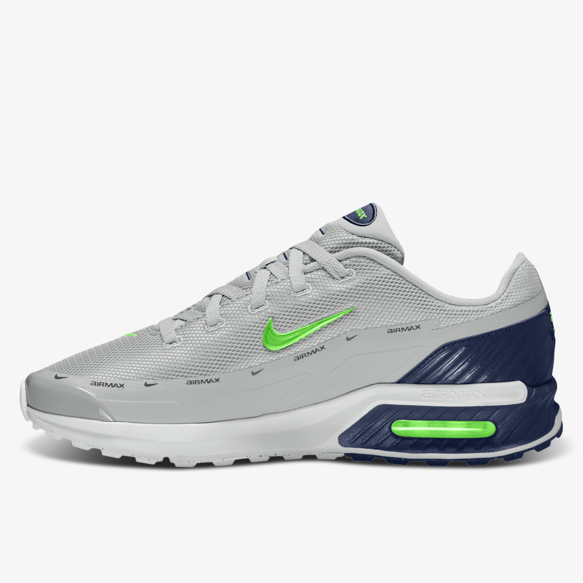 Moderner grauer Sneaker mit grünen Details und komfortabler Sohle.