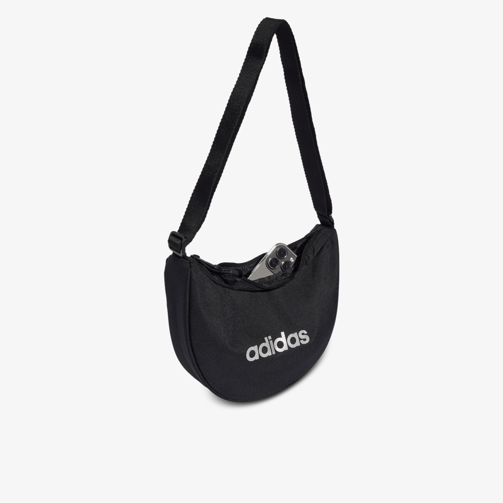 Schwarze kompakte Adidas Tasche mit verstellbarem Riemen und auffälligem Logo, sportlich und robust
