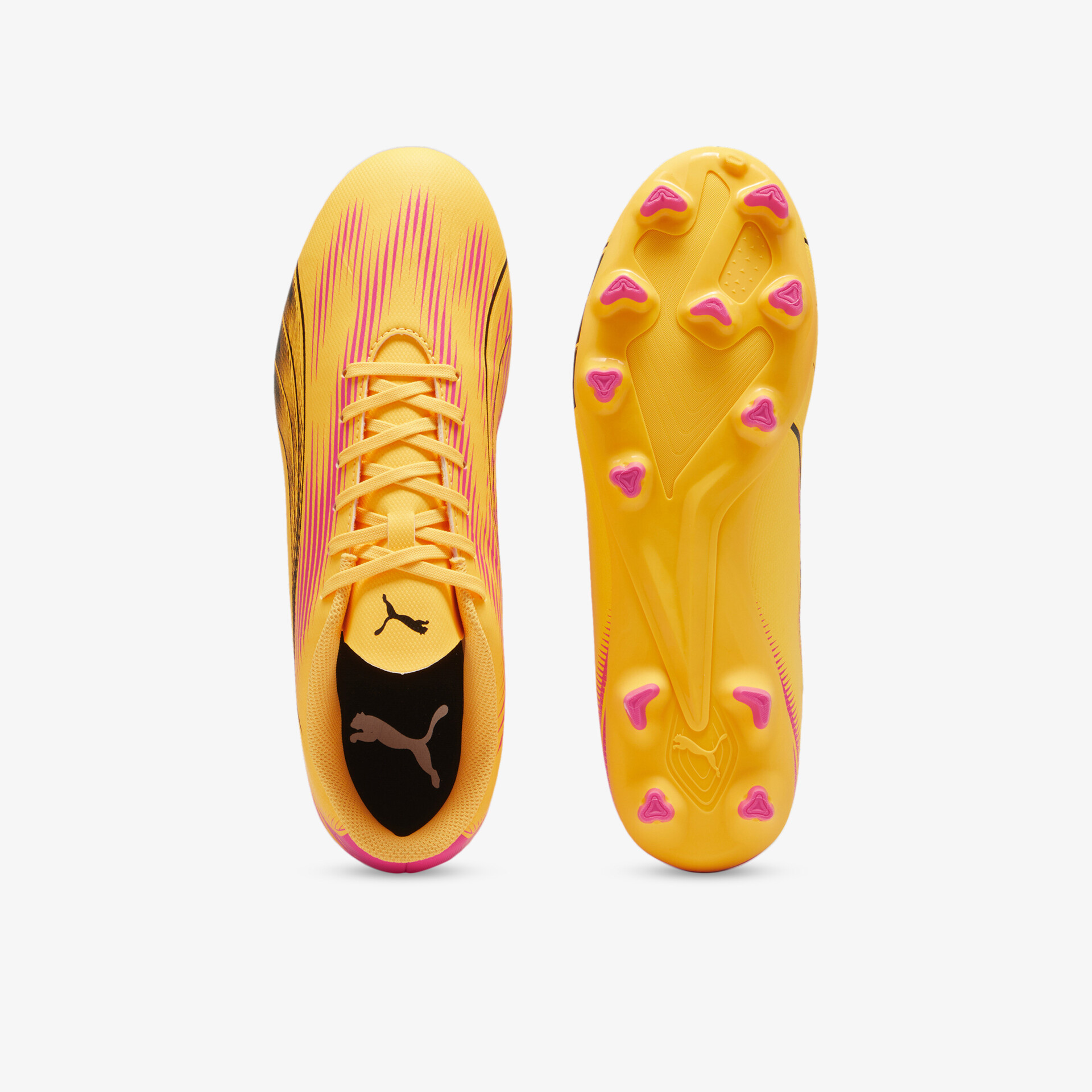 Fußballschuh mit gelber oberfläche und pinken nagelähnlichen noppen für optimalen halt und beweglichkeit