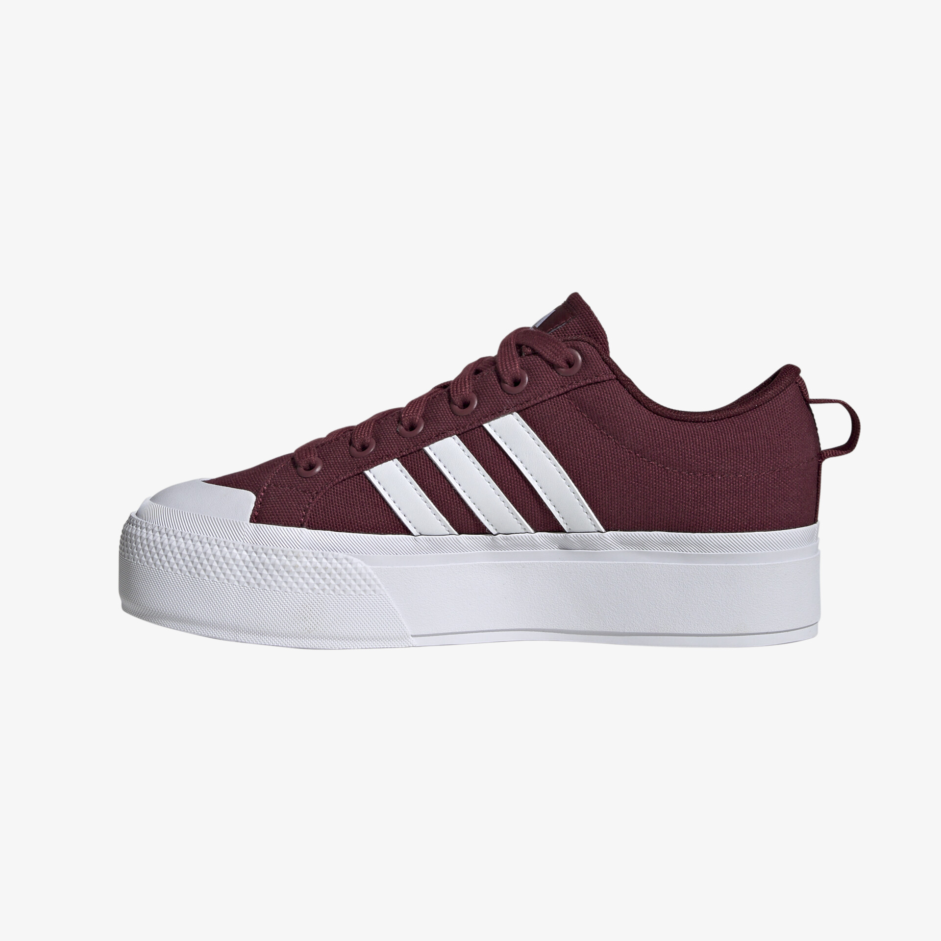 Klassischer Sneaker in Bordeaux mit weißem Plateau und ikonischen Streifen für maximalen Komfort und Stil.