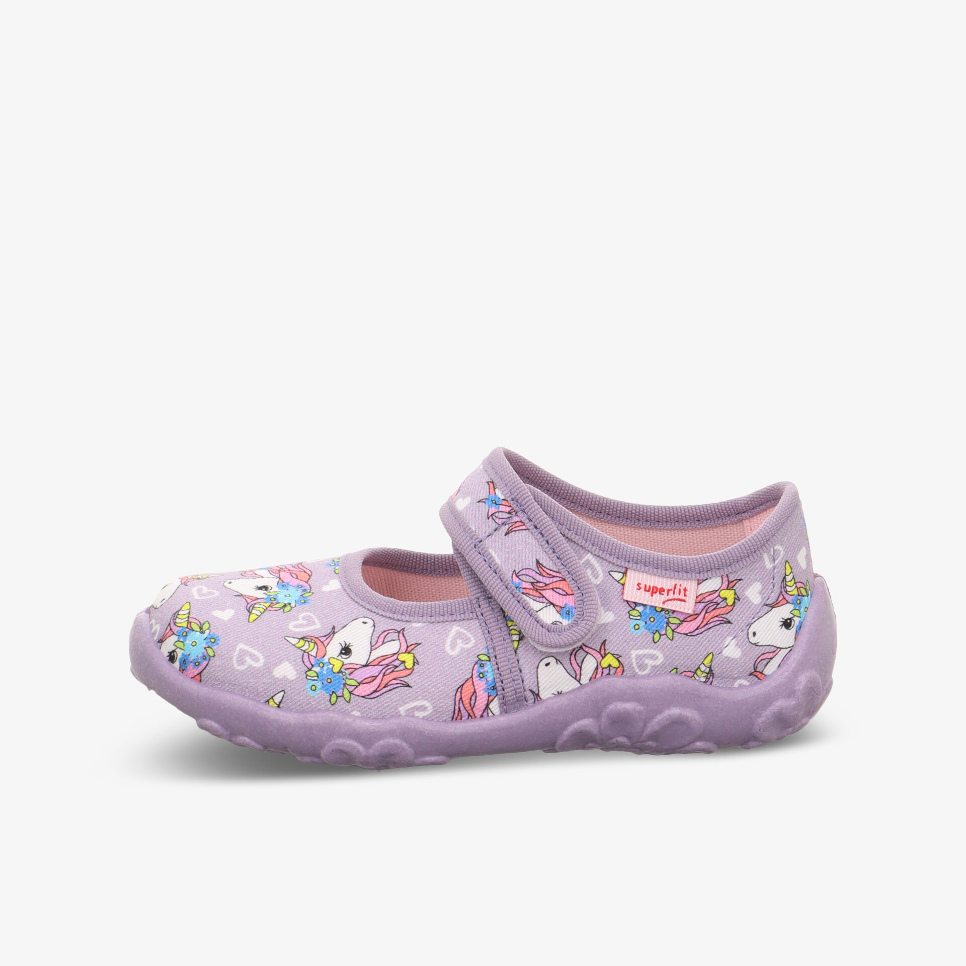 Leichter Kinderschuh mit bunten Einhorn-Motiven, bequemer Klettverschluss und rutschfester flexibler Sohle seitlich sichtbar