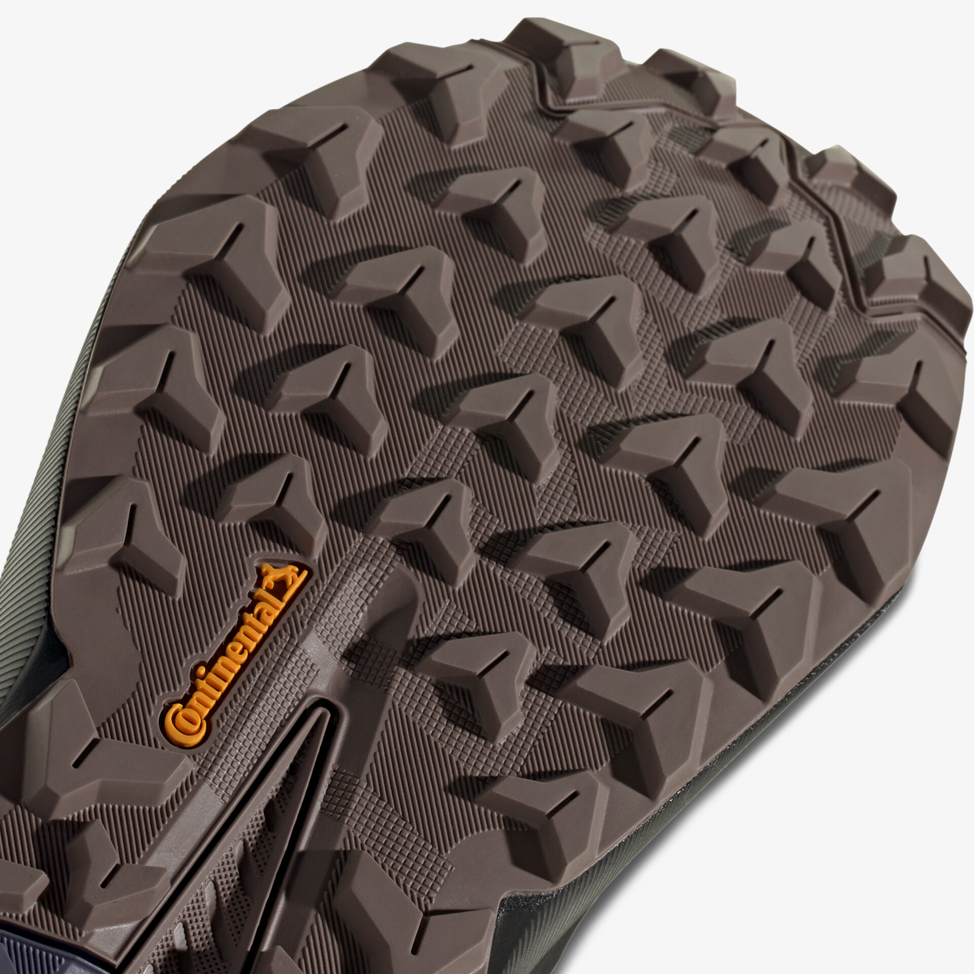 Detailaufnahme der robusten Continental Gummi-Laufsohle mit tiefem, griffigem Profil für optimalen Halt